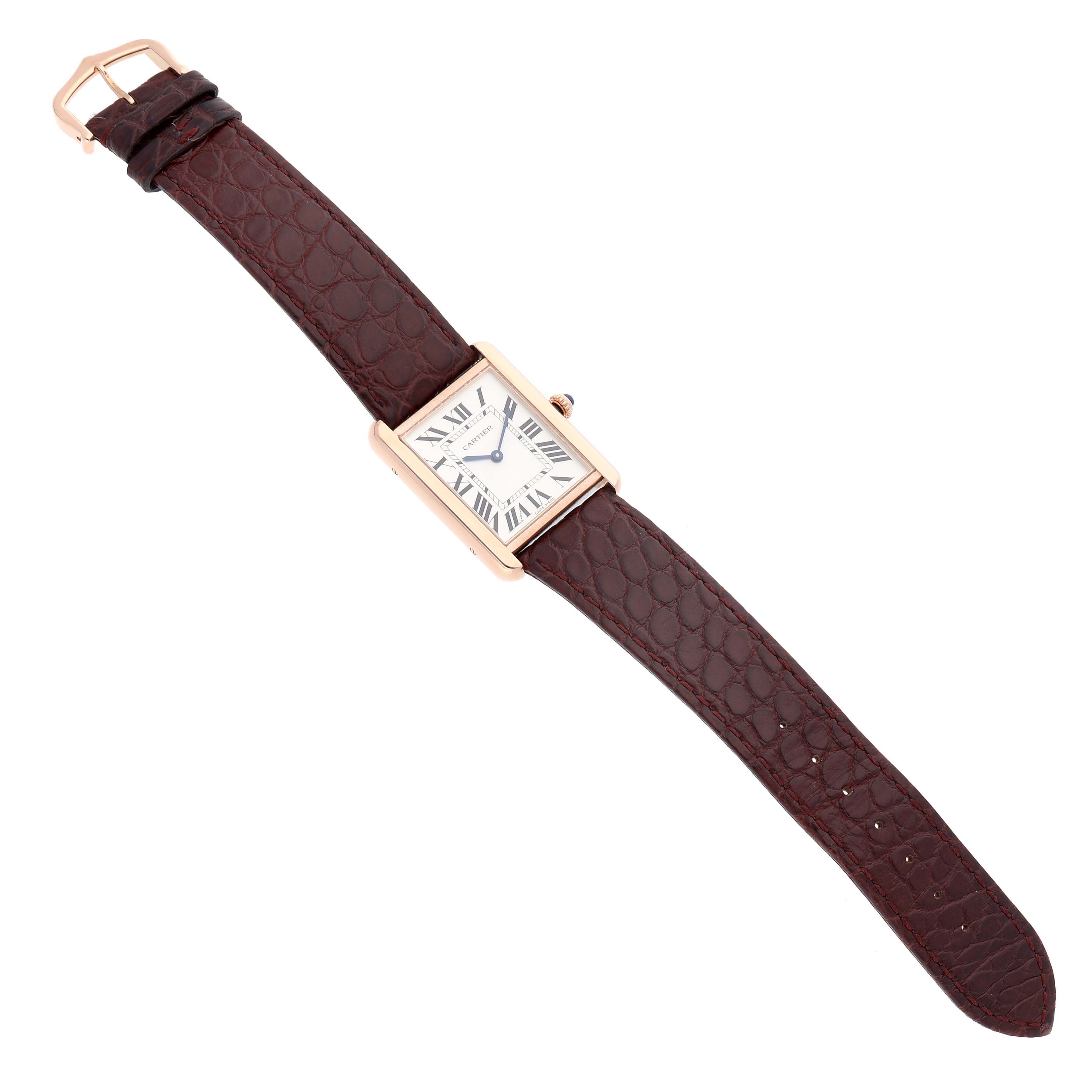 The Cartier Tank Solo W5200025 Men's Rose Gold Silver Dial watch is shown from a top view, displaying the face, case, and leather strap.