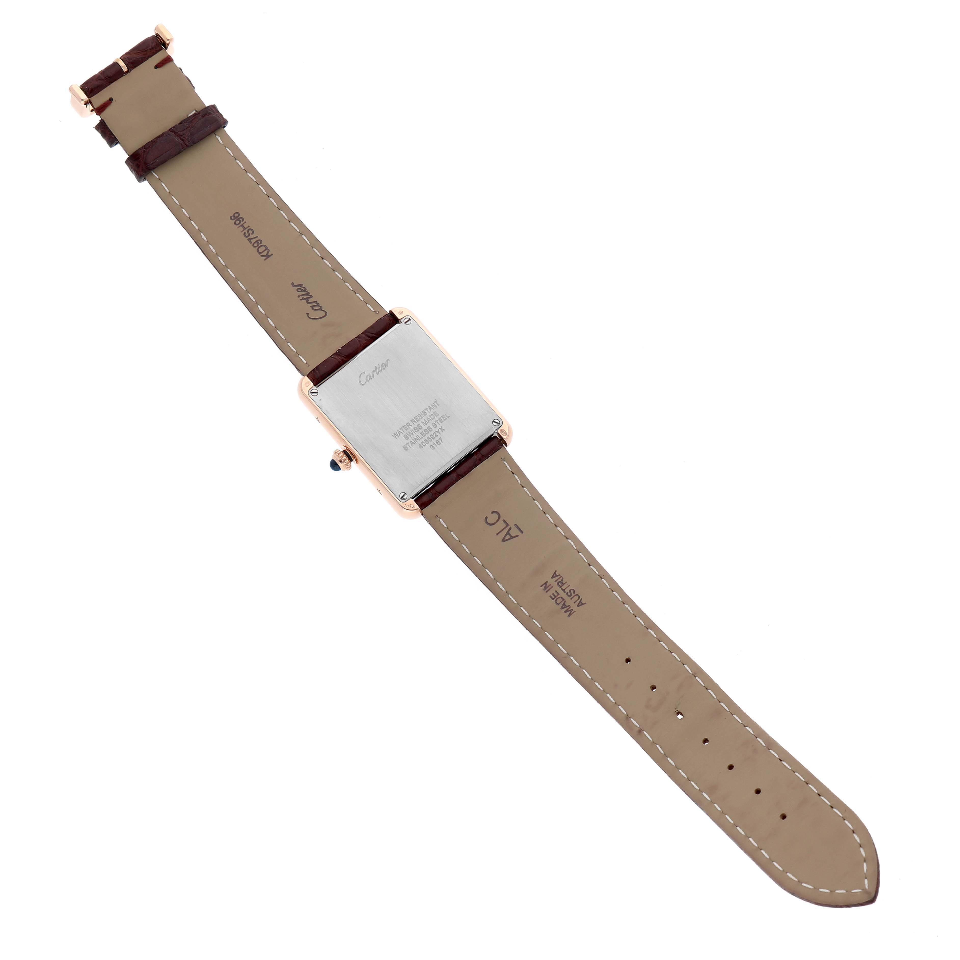 The Cartier Tank Solo W5200025 Men's Rose Gold Silver Dial watch is shown from the back, highlighting the case back and leather strap.