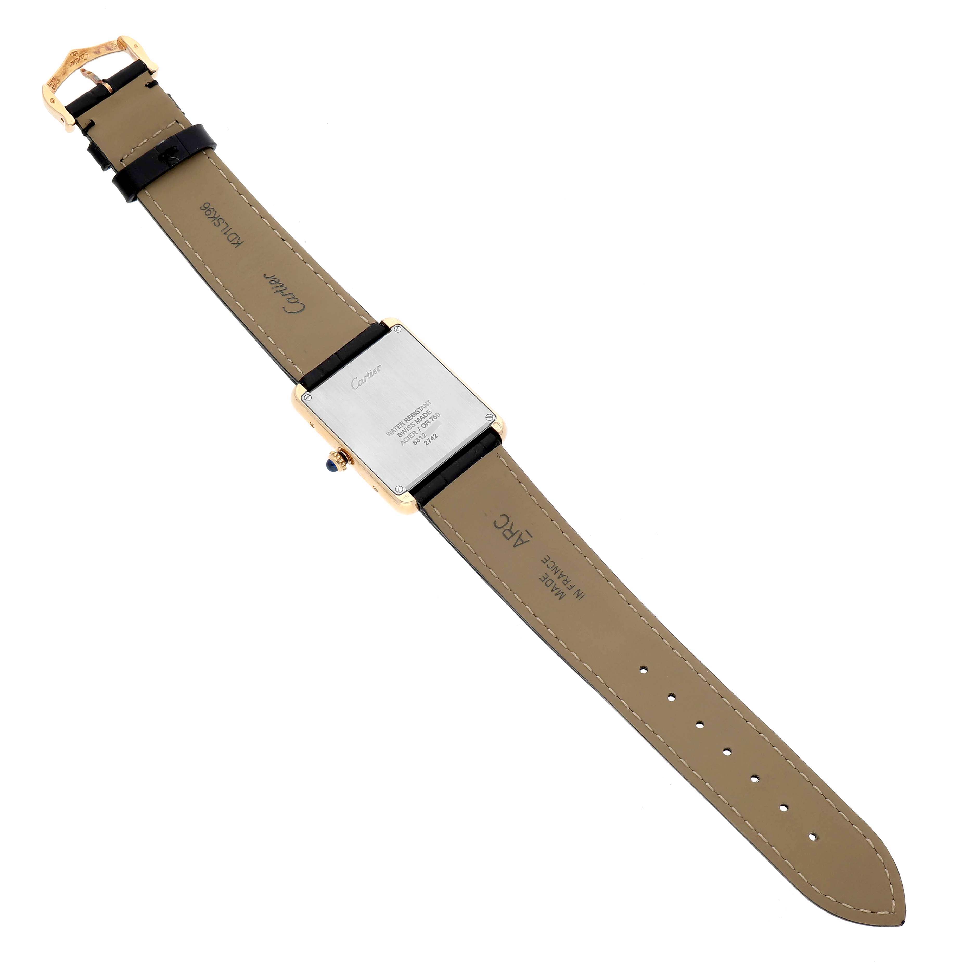 The Cartier Tank Solo W1018855 Men's Yellow Gold Silver Dial watch is shown from the back, revealing the case, strap, buckle, and manufacturer's engravings.