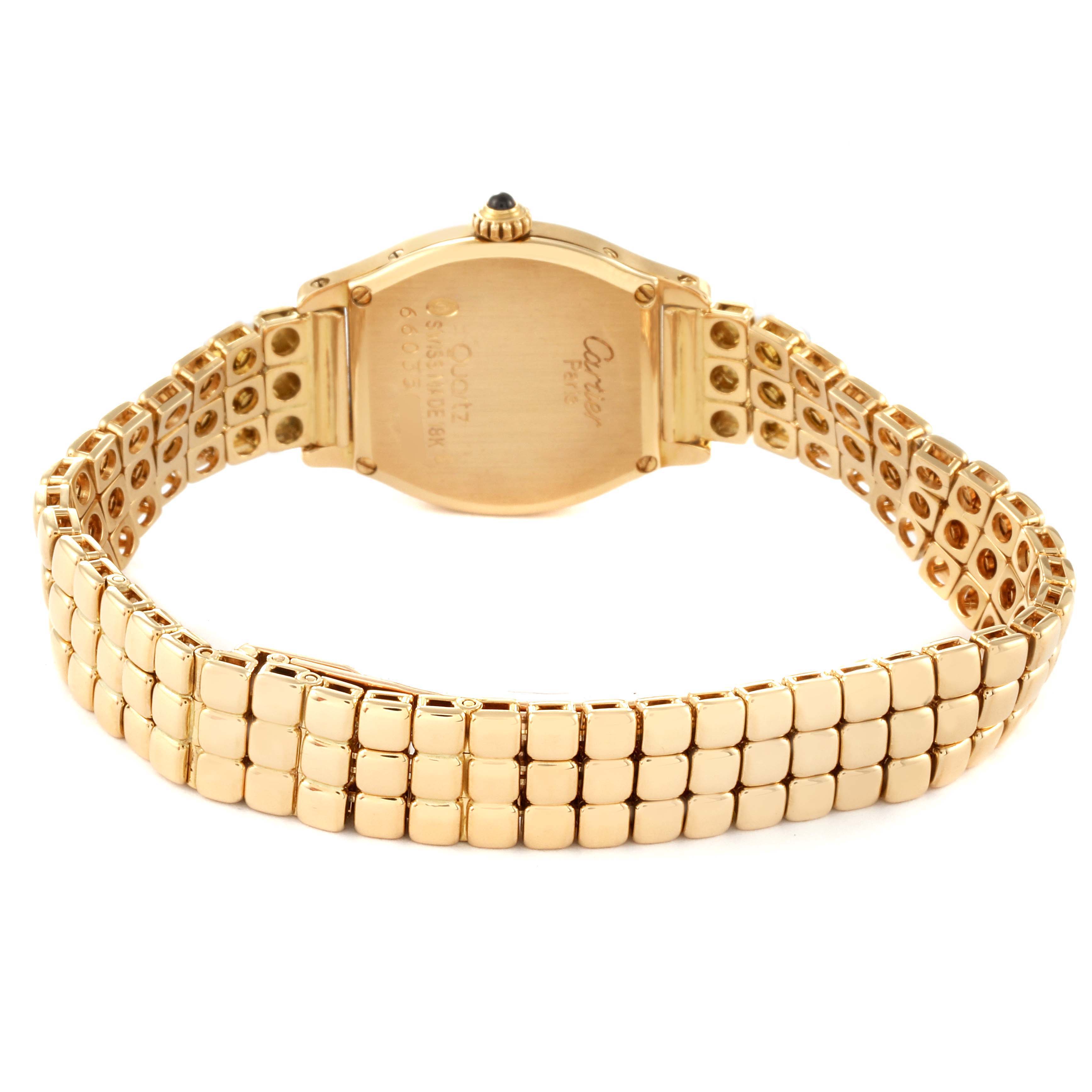 The image shows the back view of a Cartier Tortue Women's Yellow Gold Silver Dial Women's Yellow Gold Silver Dial watch, highlighting the case back and bracelet.