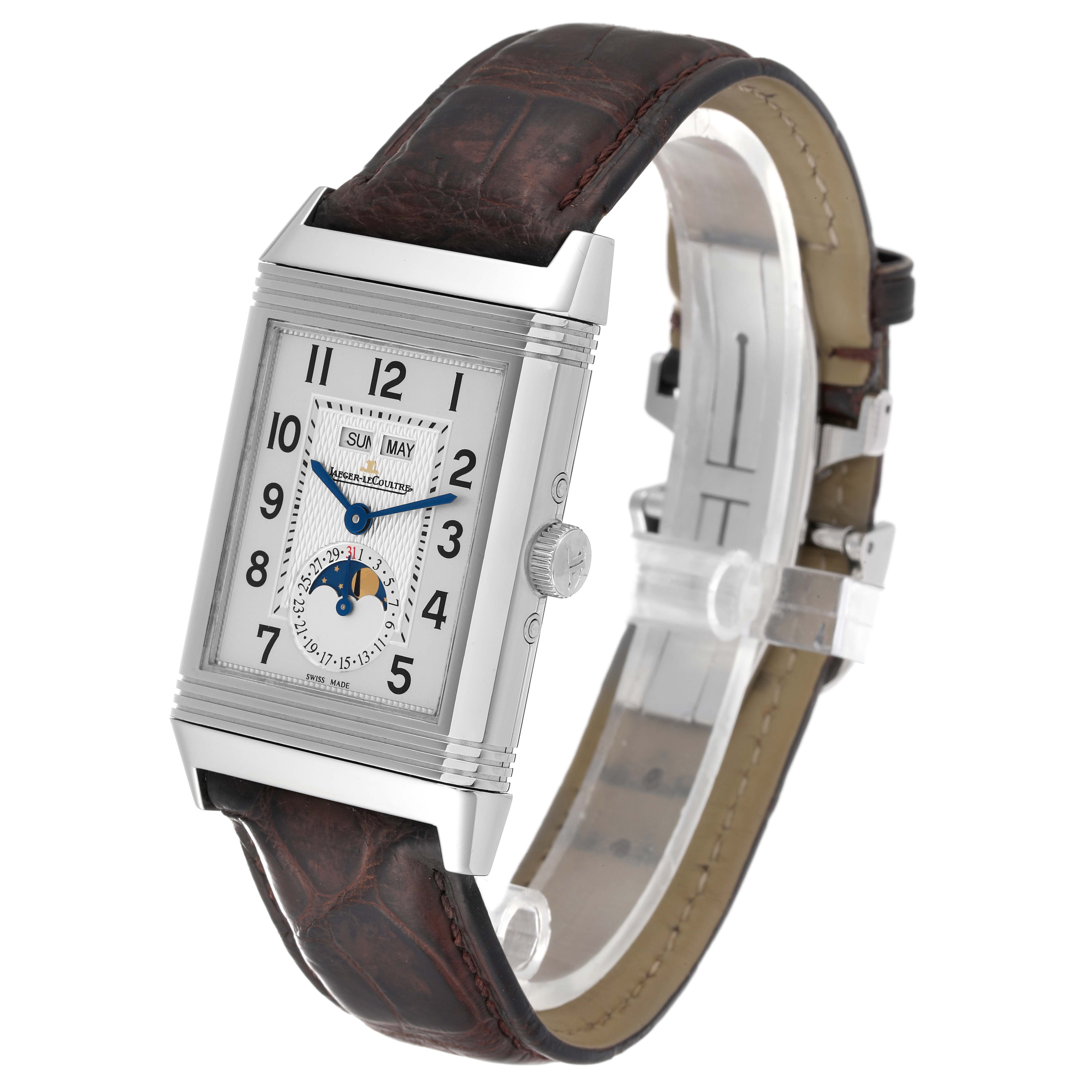 The image shows a Jaeger-LeCoultre Reverso watch at a three-quarter angle, highlighting the face, crown, strap, and buckle.