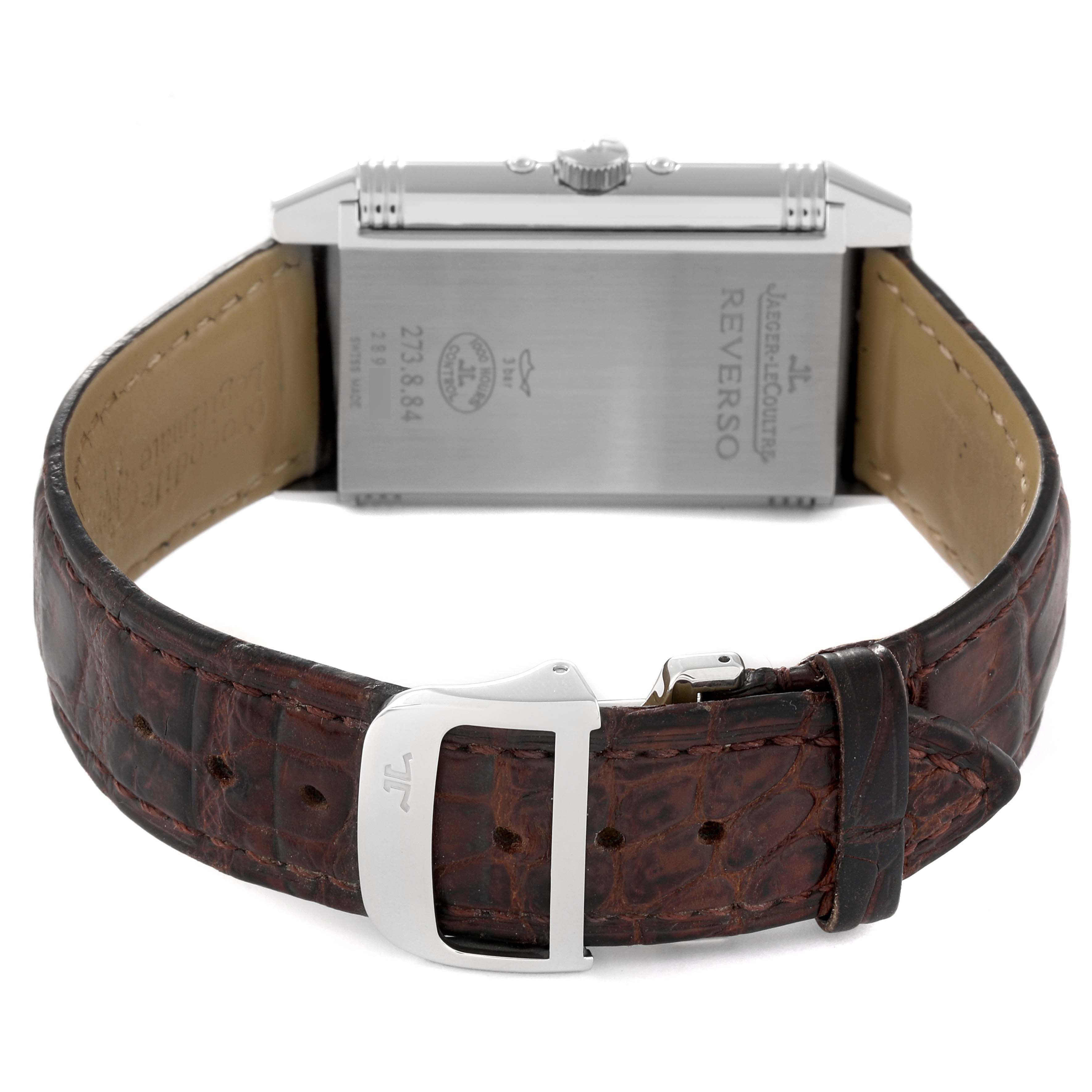 The image shows the back view of the Jaeger LeCoultre Reverso Q3758420 Men
s Stainless Steel Silver Dial Q3758420 Men
s Stainless Steel Silver Dial watch, focusing on the case back and leather strap.