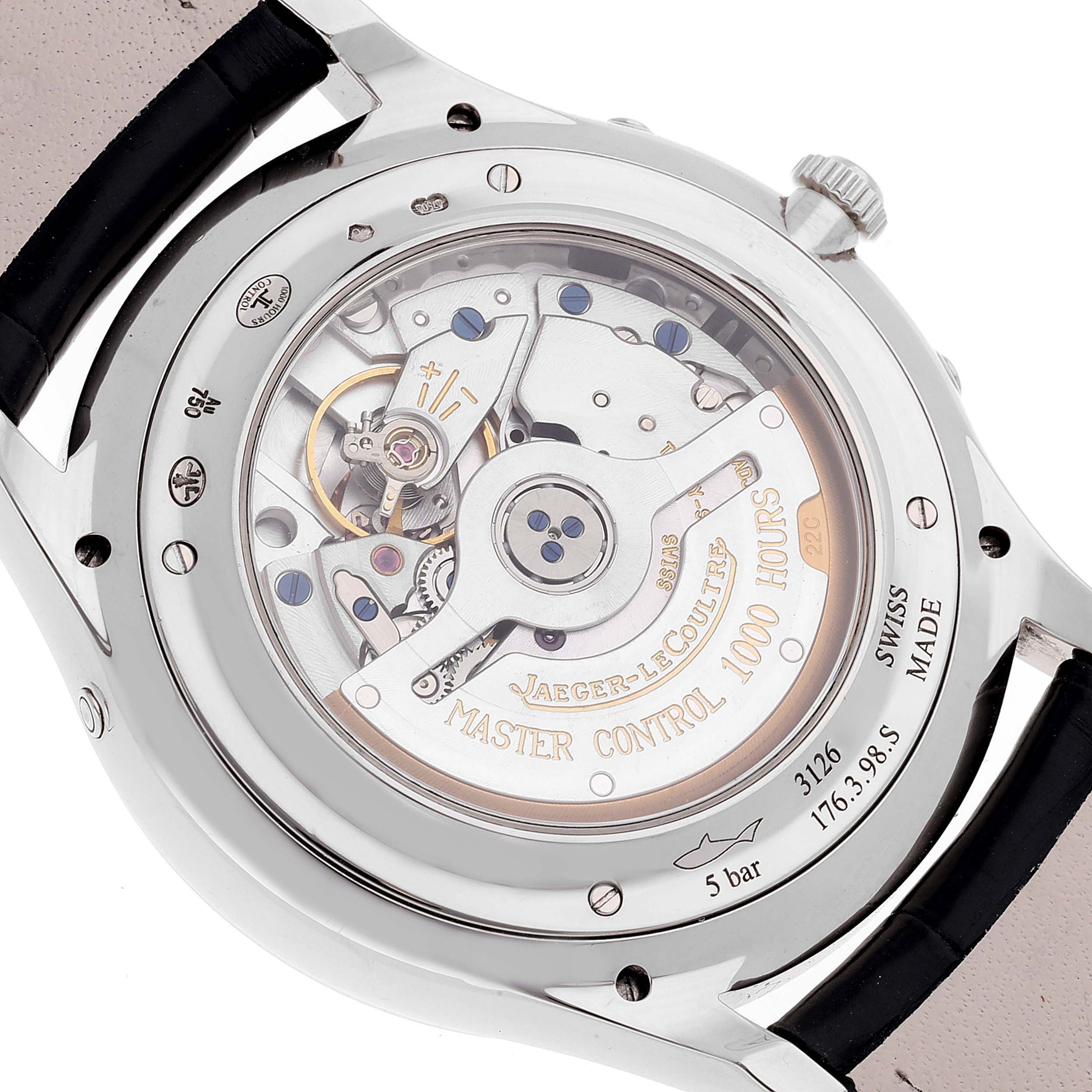 The image shows the back of a Jaeger-LeCoultre Master Control watch, highlighting its movement and engravings.