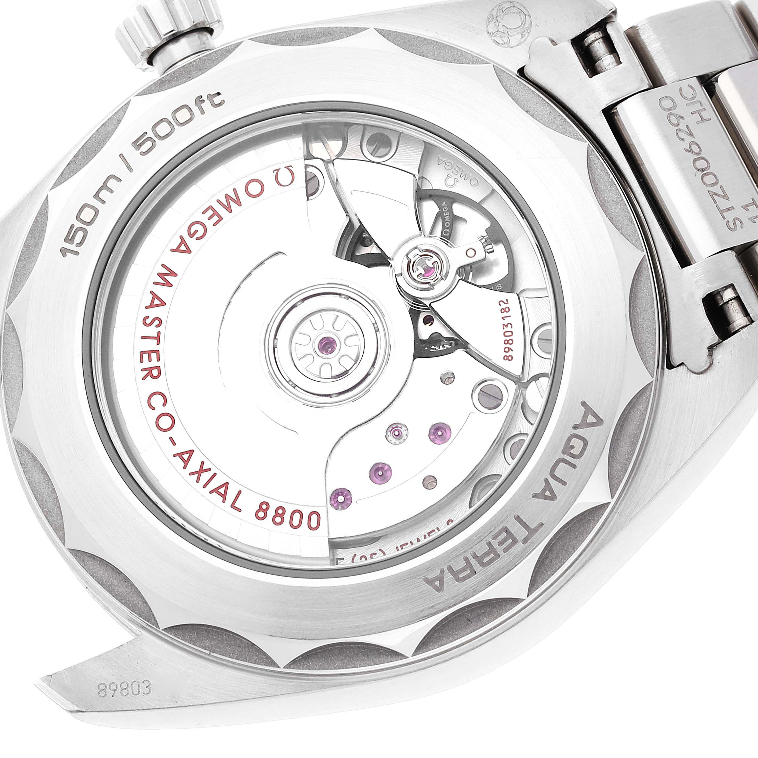 This image shows the back view of the Omega Aqua Terra 220.10.38.20.02.001 Men
s Stainless Steel Silver Dial 220.10.38.20.02.001 Men
s Stainless Steel Silver Dial watch, highlighting its movement and transparent case back.