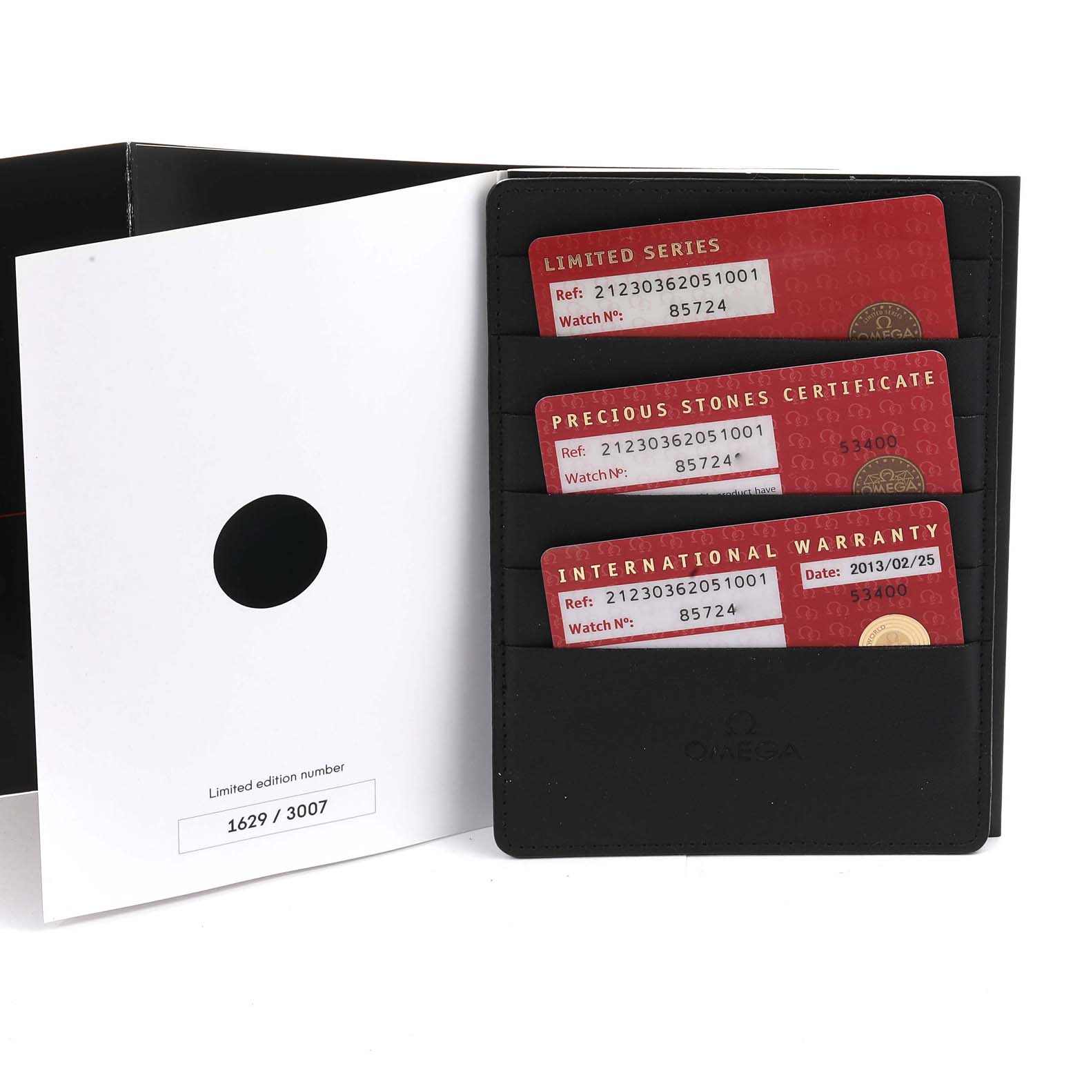 The image shows the accessories of an Omega Seamaster 212.30.36.20.51.001 Men's Stainless Steel Black Dial 212.30.36.20.51.001 Men's Stainless Steel Black Dial, including limited series, precious stones certificate, and international warranty cards.