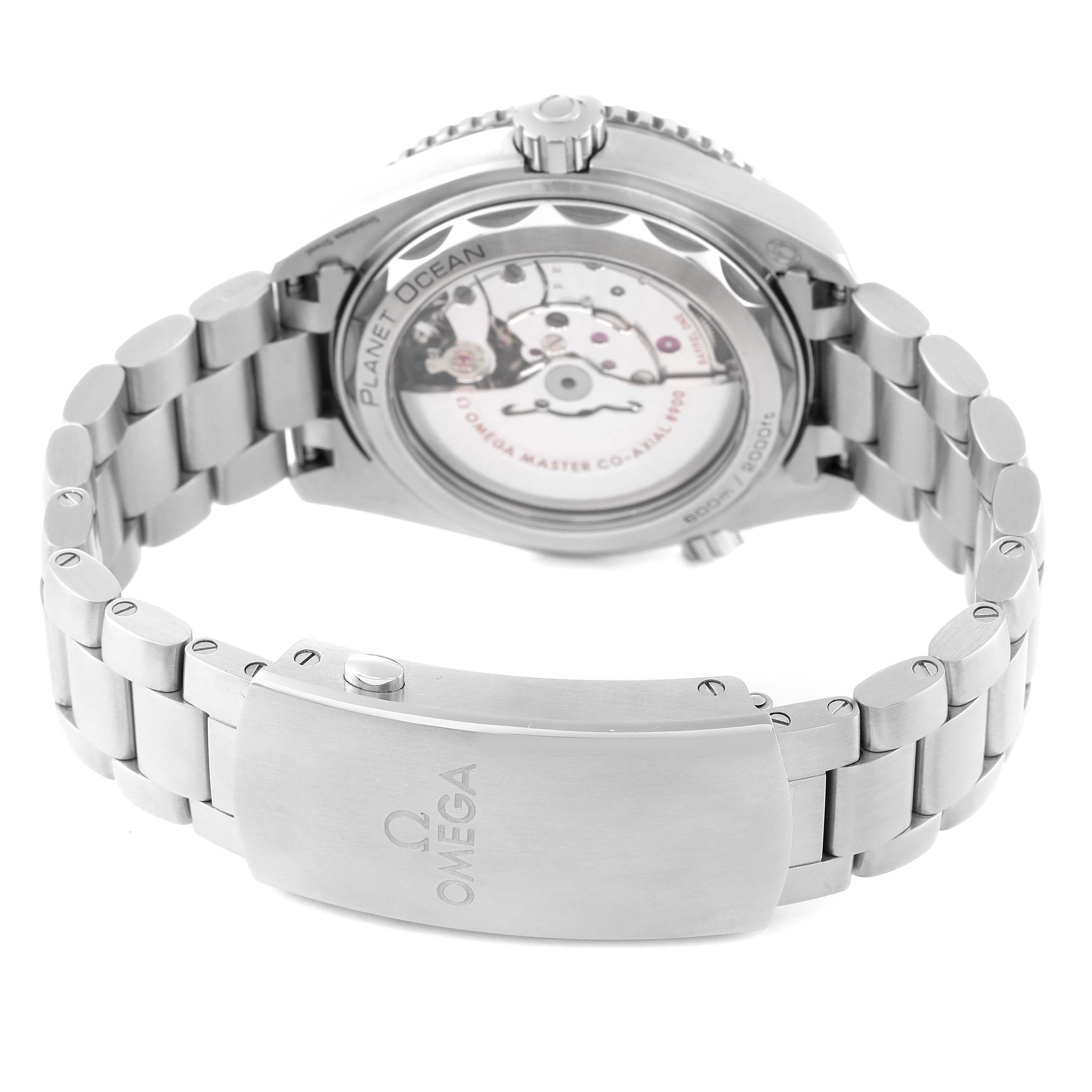 The Omega Planet Ocean 215.30.44.21.01.001 Men
s Stainless Steel Black Dial 215.30.44.21.01.001 Men
s Stainless Steel Black Dial watch is displayed from a rear angle, showcasing the case back and stainless steel bracelet clasp.