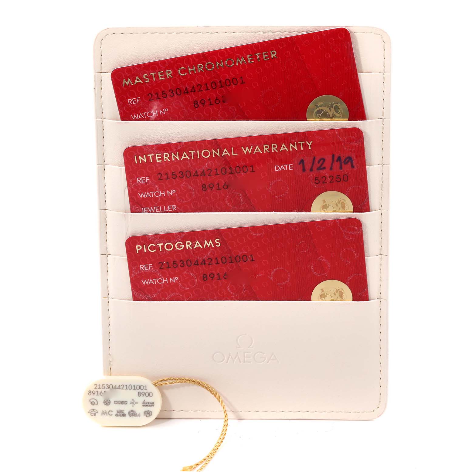 The image shows a set of Omega Planet Ocean 215.30.44.21.01.001 Men
s Stainless Steel Black Dial 215.30.44.21.01.001 Men
s Stainless Steel Black Dial watch accessories, including Master Chronometer, International Warranty, and Pictograms cards, along with a tag.