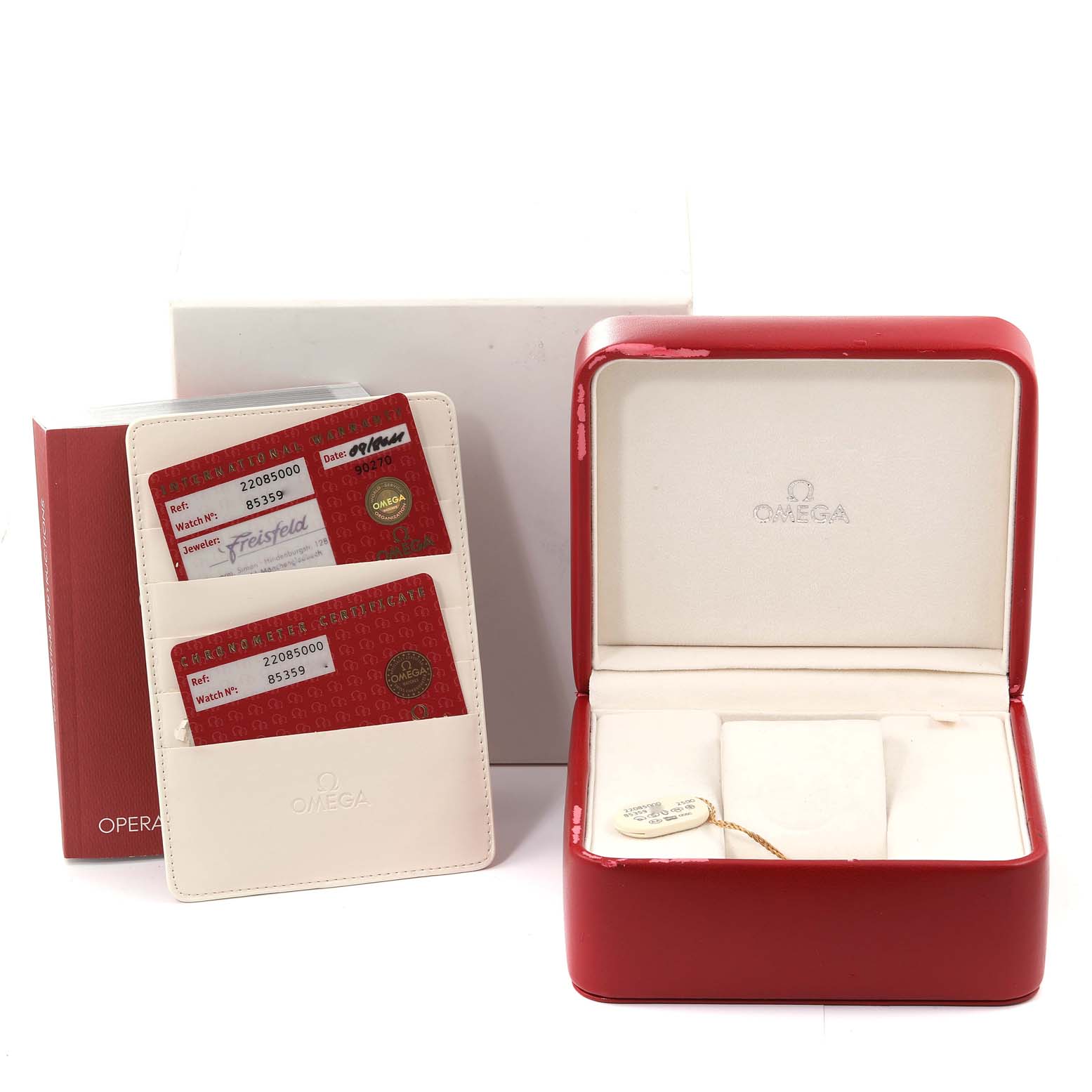 The image shows the Omega Planet Ocean 2208.50.00 Men
s Stainless Steel Black Dial 2208.50.00 Men
s Stainless Steel Black Dial watch
s red box, documentation, and warranty cards from a side angle.