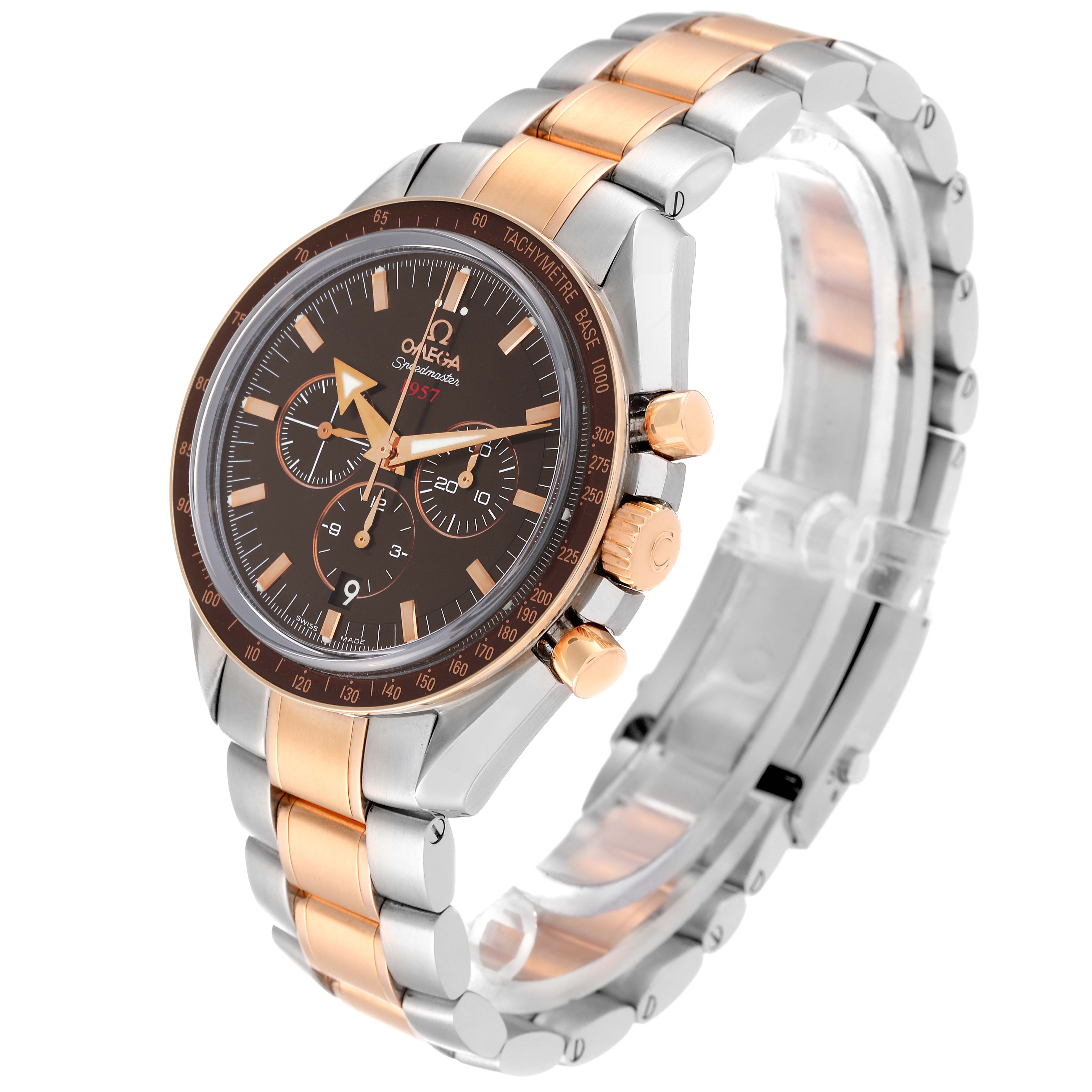 The Omega Speedmaster 321.90.42.50.13.001 Men's Steel and Gold (two tone) Brown Dial 321.90.42.50.13.001 Men's Steel and Gold (two tone) Brown Dial watch is shown in a three-quarter angle, highlighting its face, bezel, and two-tone bracelet.
