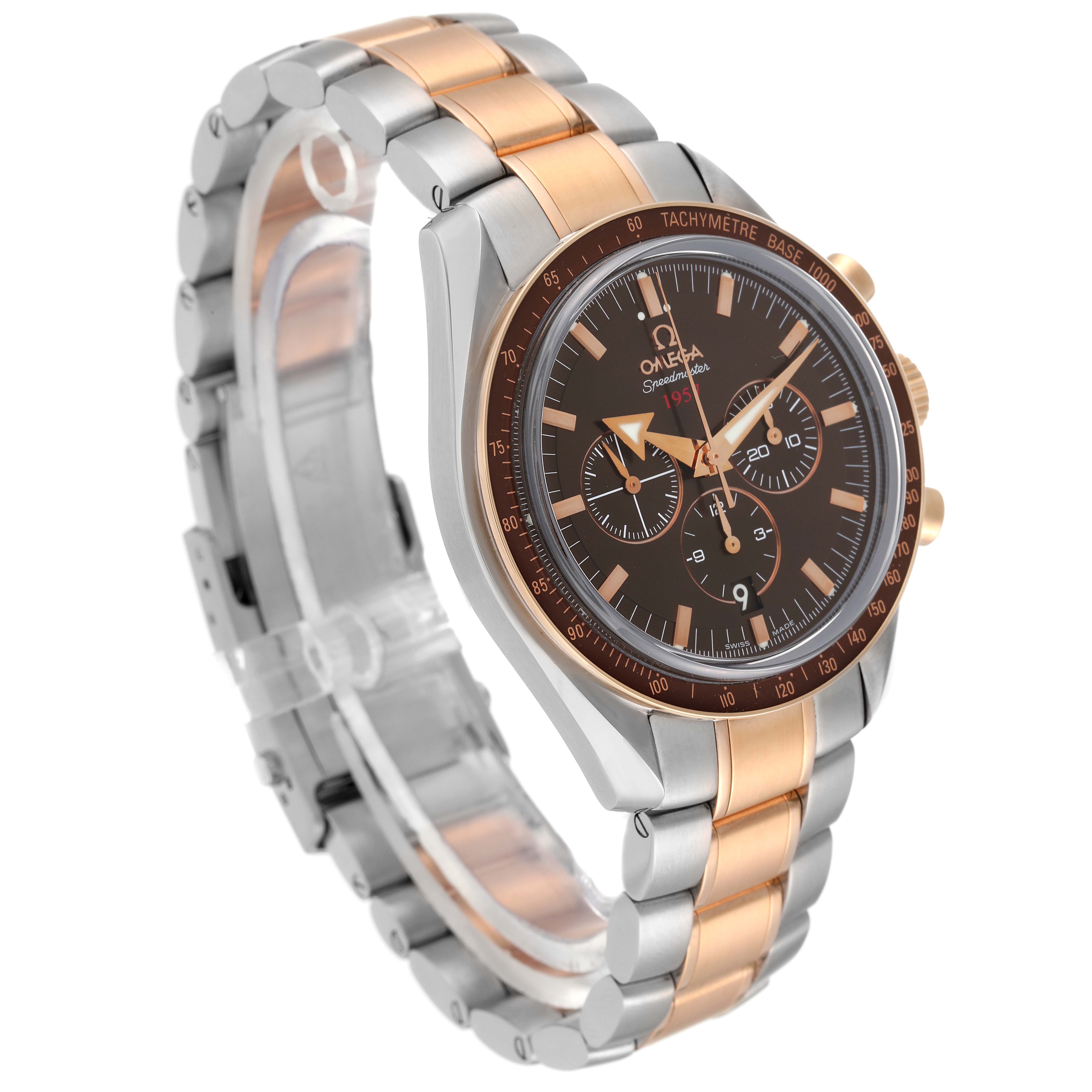 The Omega Speedmaster 321.90.42.50.13.001 Men's Steel and Gold (two tone) Brown Dial 321.90.42.50.13.001 Men's Steel and Gold (two tone) Brown Dial watch is shown at a three-quarter angle, highlighting its two-tone metal strap, bezel, and dial.