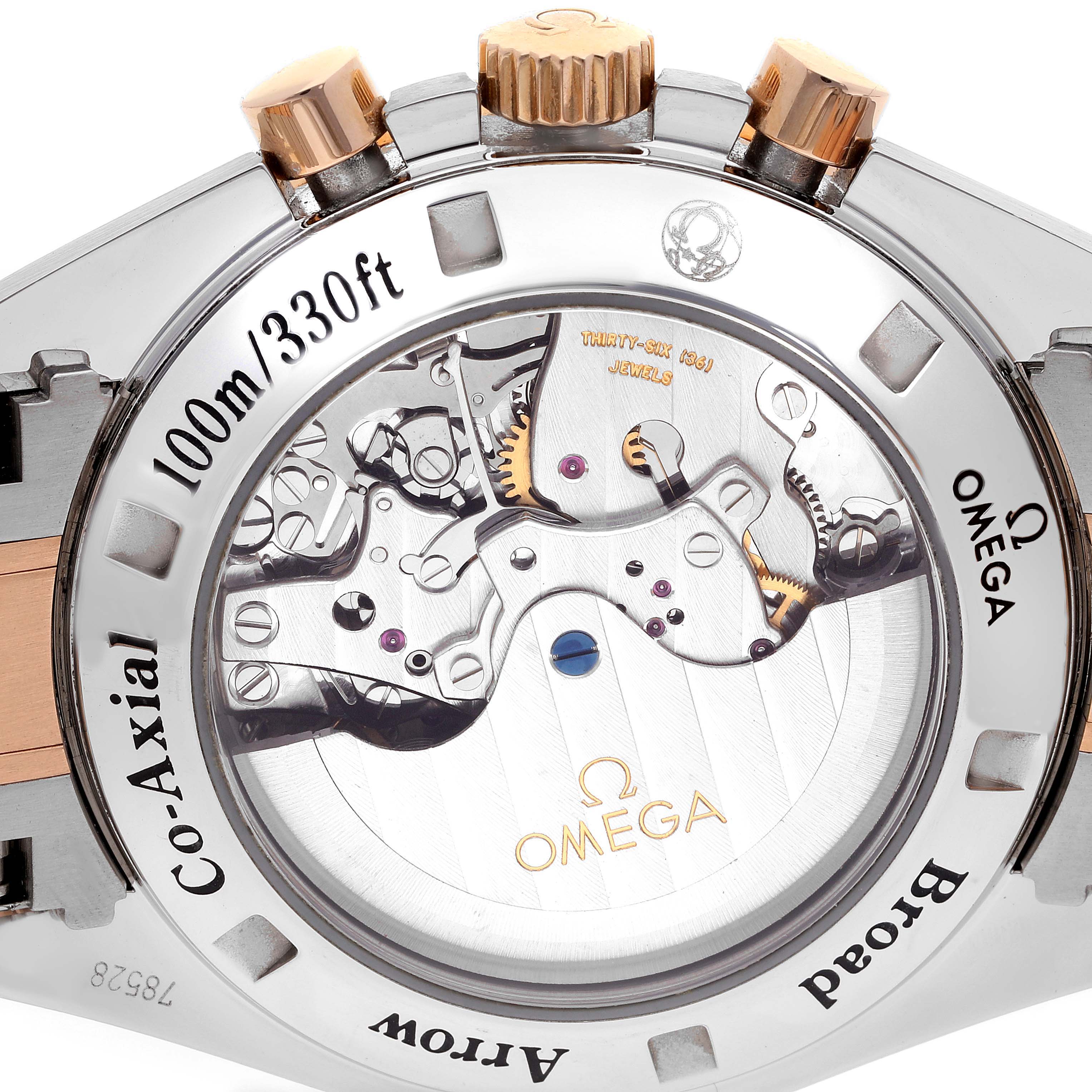 The image shows the back view of an Omega Speedmaster 321.90.42.50.13.001 Men's Steel and Gold (two tone) Brown Dial 321.90.42.50.13.001 Men's Steel and Gold (two tone) Brown Dial watch, focusing on the movement and inscriptions on the case back.