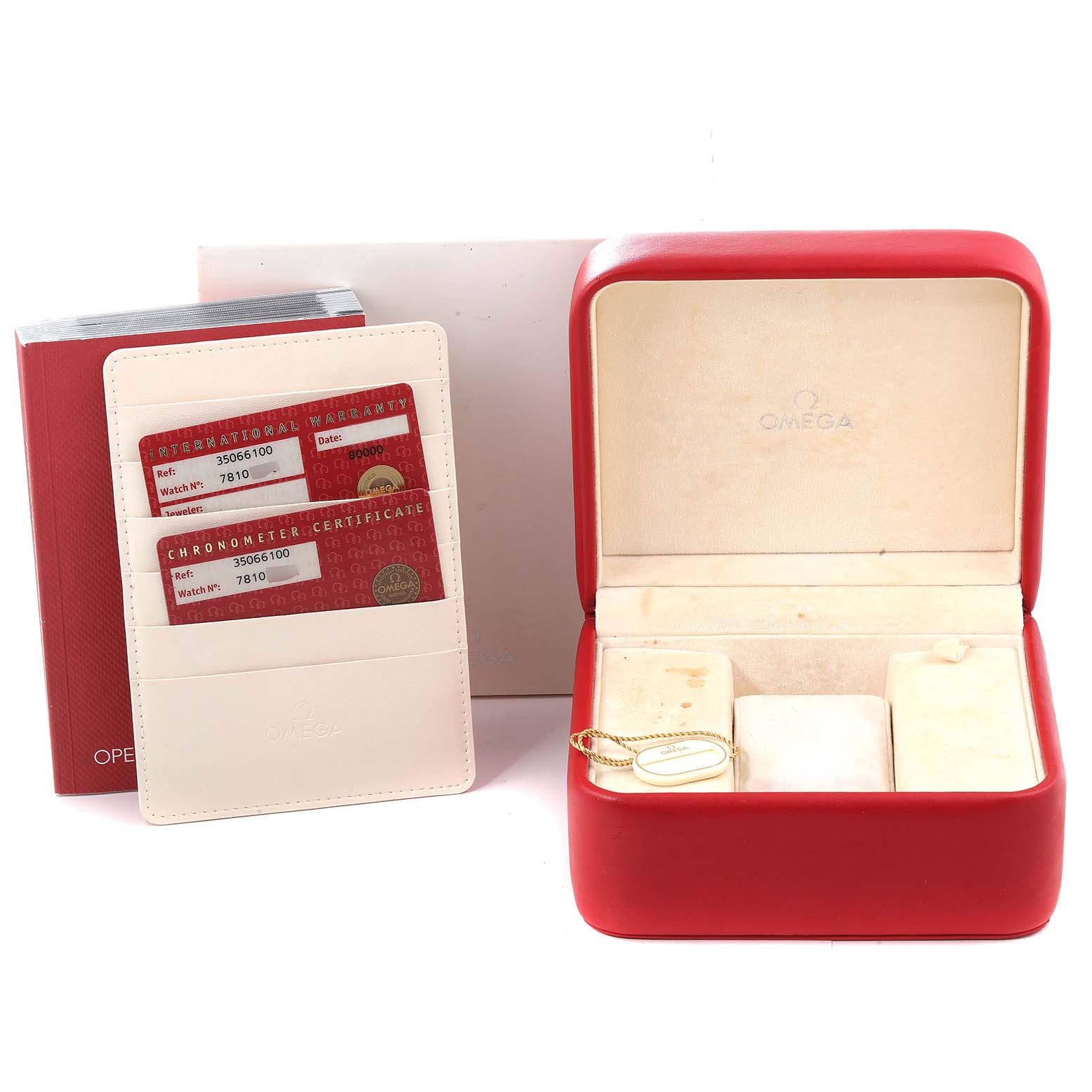 The image shows an Omega Speedmaster 3506.61.00 Men
s Stainless Steel Red Dial 3506.61.00 Men
s Stainless Steel Red Dial watch box, documents, and accessories from a front angle.