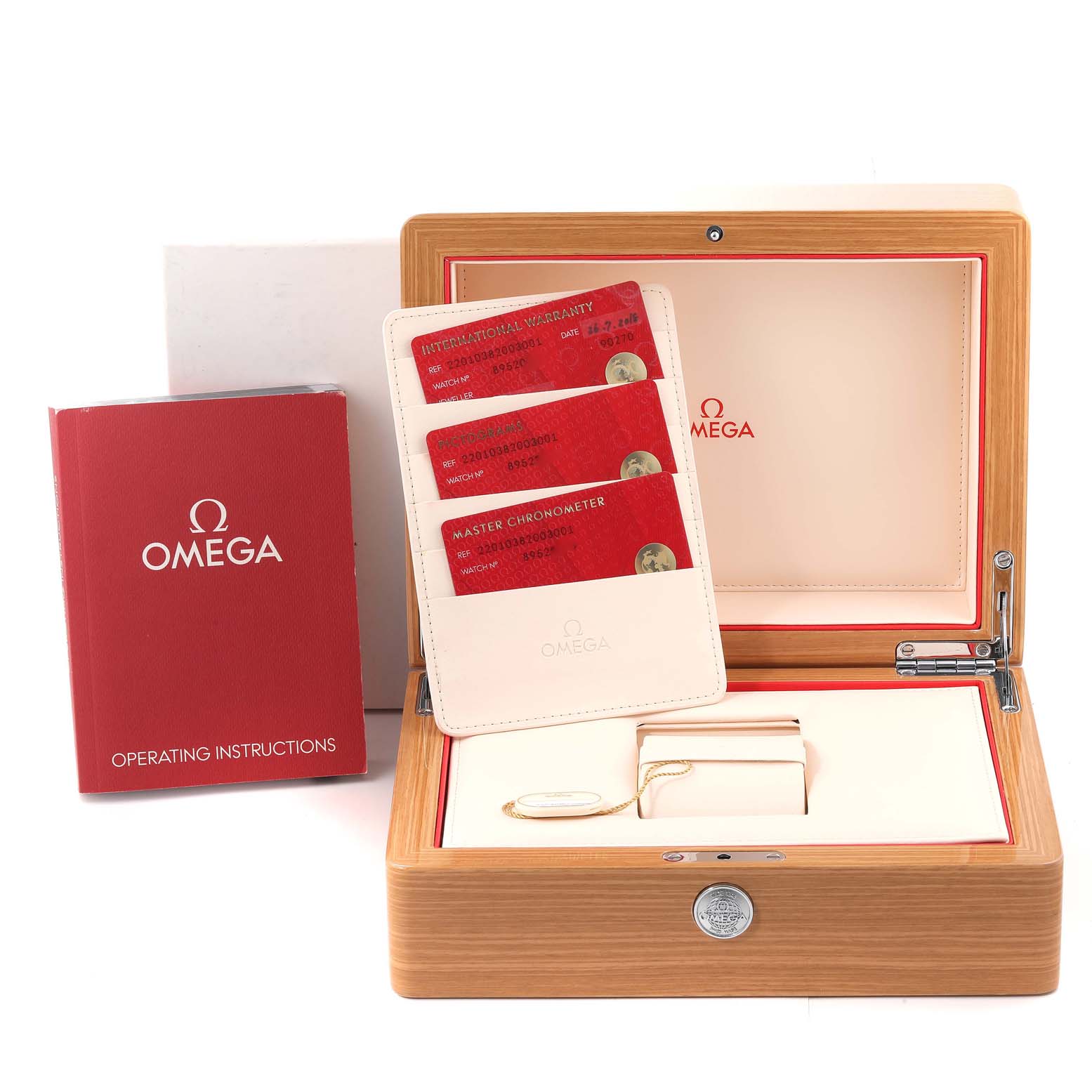 The image shows the Omega Aqua Terra 220.10.38.20.03.001 Men's Stainless Steel Blue Dial 220.10.38.20.03.001 Men's Stainless Steel Blue Dial watch accessories including the operating instructions, warranty cards, and the watch box.