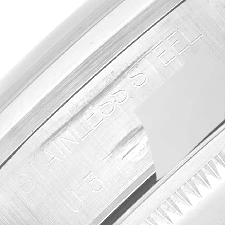 This image shows a close-up angle of the stainless steel bezel with markings on a Rolex Air-King 14000 Men's Stainless Steel Pink Dial 14000 Men's Stainless Steel Pink Dial watch.