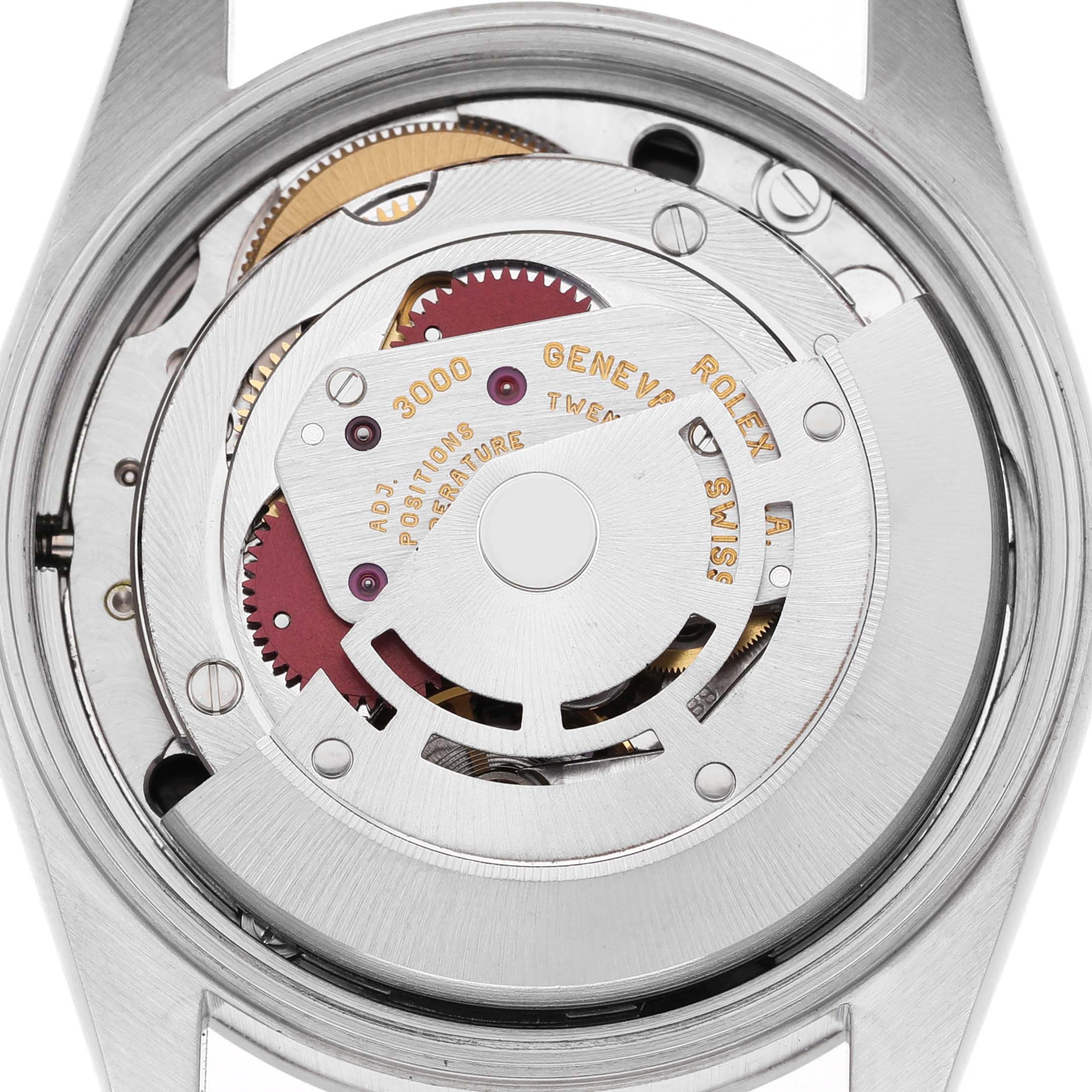 The Rolex Air-King 14000 Men's Stainless Steel Black Dial watch is shown from the back, revealing its movement and internal mechanisms.