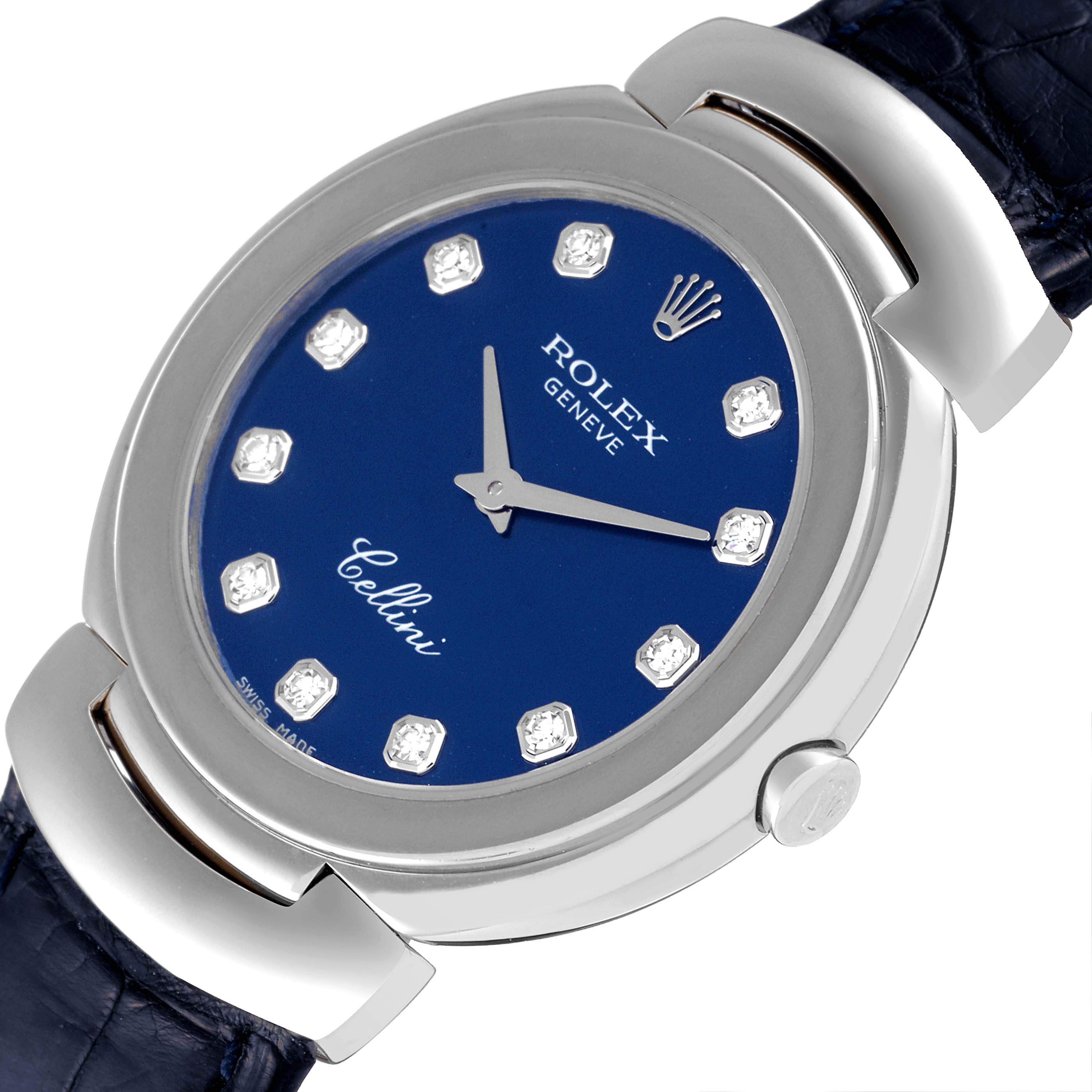 The image shows a close-up view of the Rolex Cellini 6221 Women's White Gold Blue Dial 6221 Women's White Gold Blue Dial watch featuring its blue dial, diamond hour markers, and a part of the leather strap.