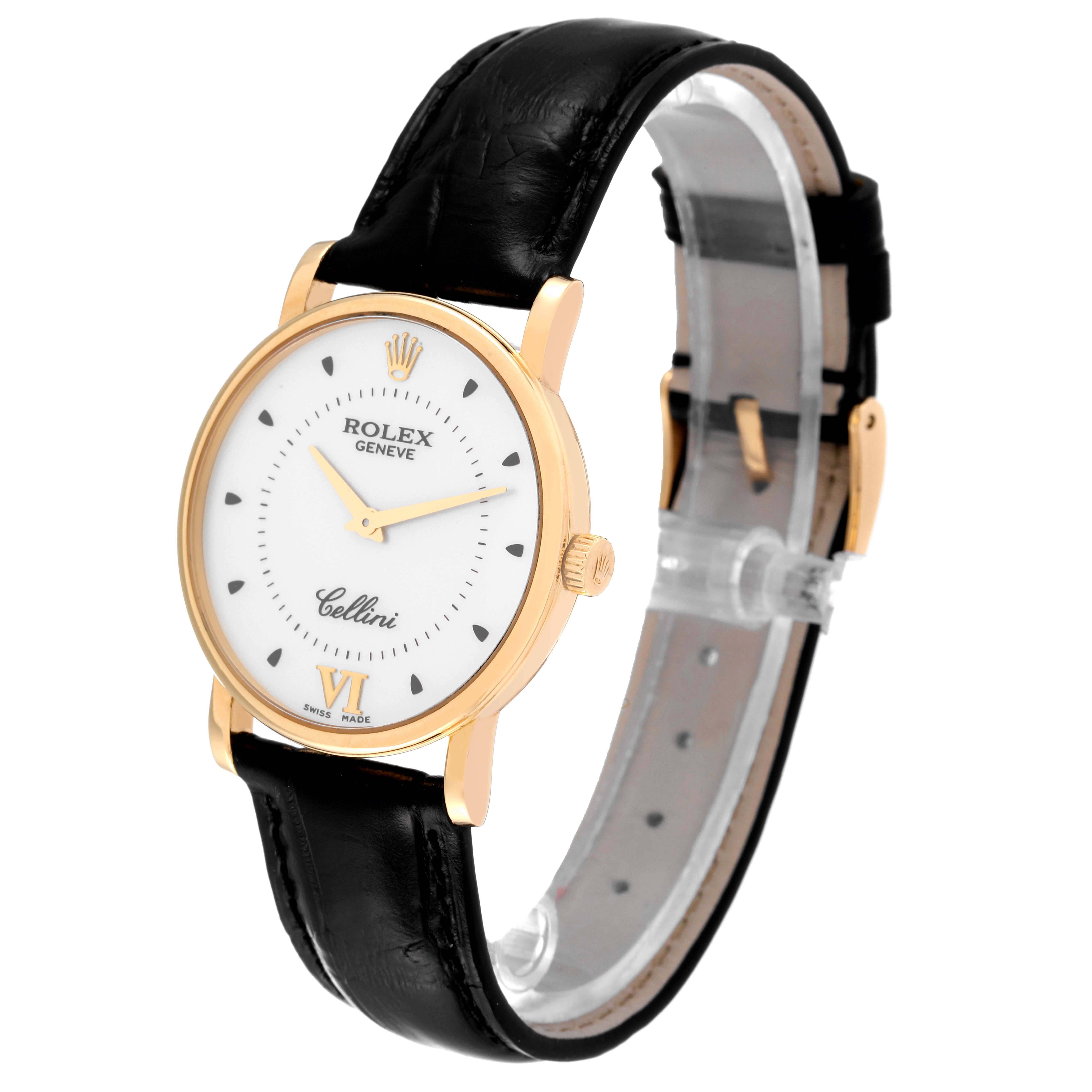 The Rolex Cellini 5115 Men's Yellow Gold Silver Dial 5115 Men's Yellow Gold Silver Dial watch is shown at an angled view, displaying the face, leather strap, case, and crown.