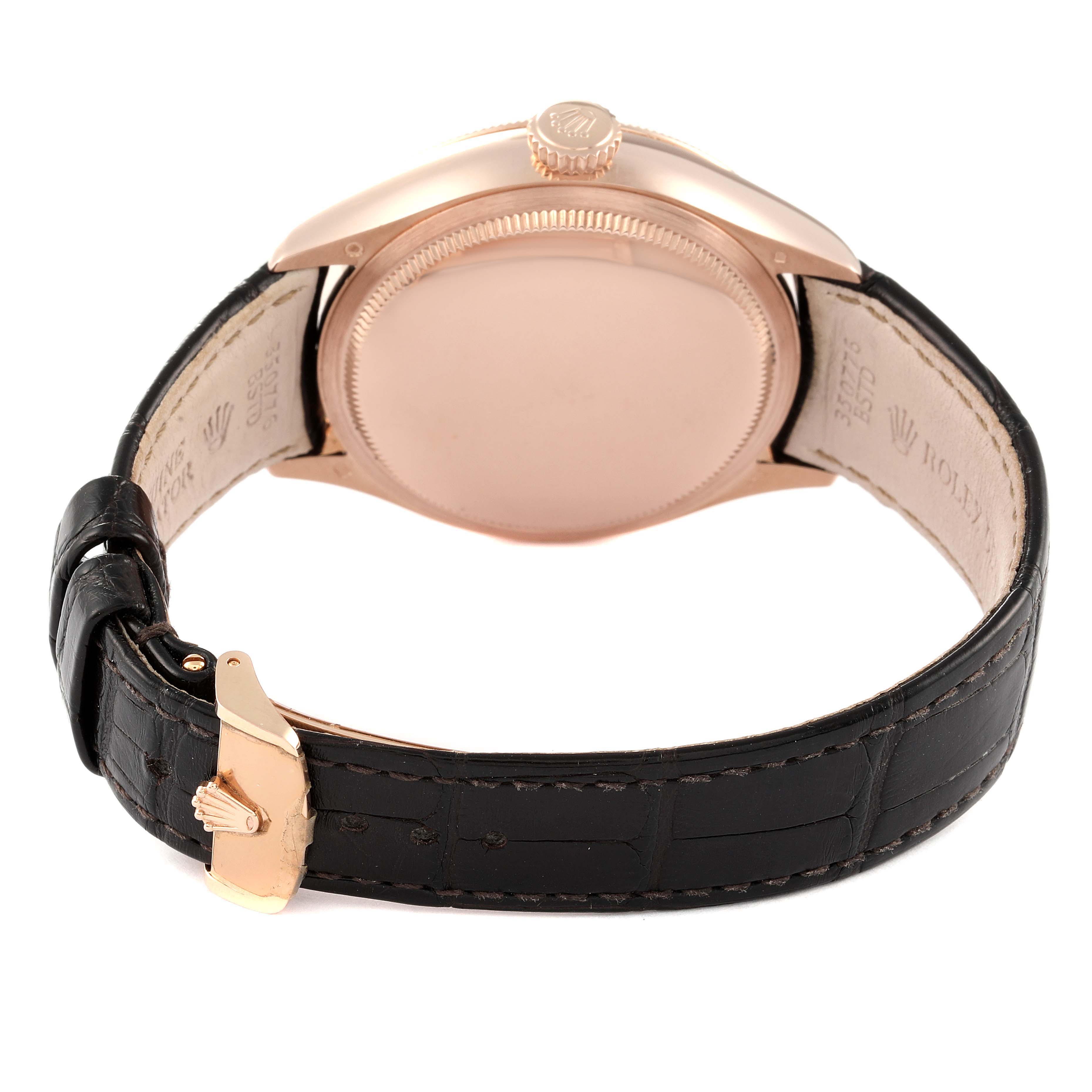 The image shows the back view of a Rolex Cellini 50535 Men's Rose Gold White Dial 50535 Men's Rose Gold White Dial watch, focusing on the case back, crown, and black leather strap with buckle.