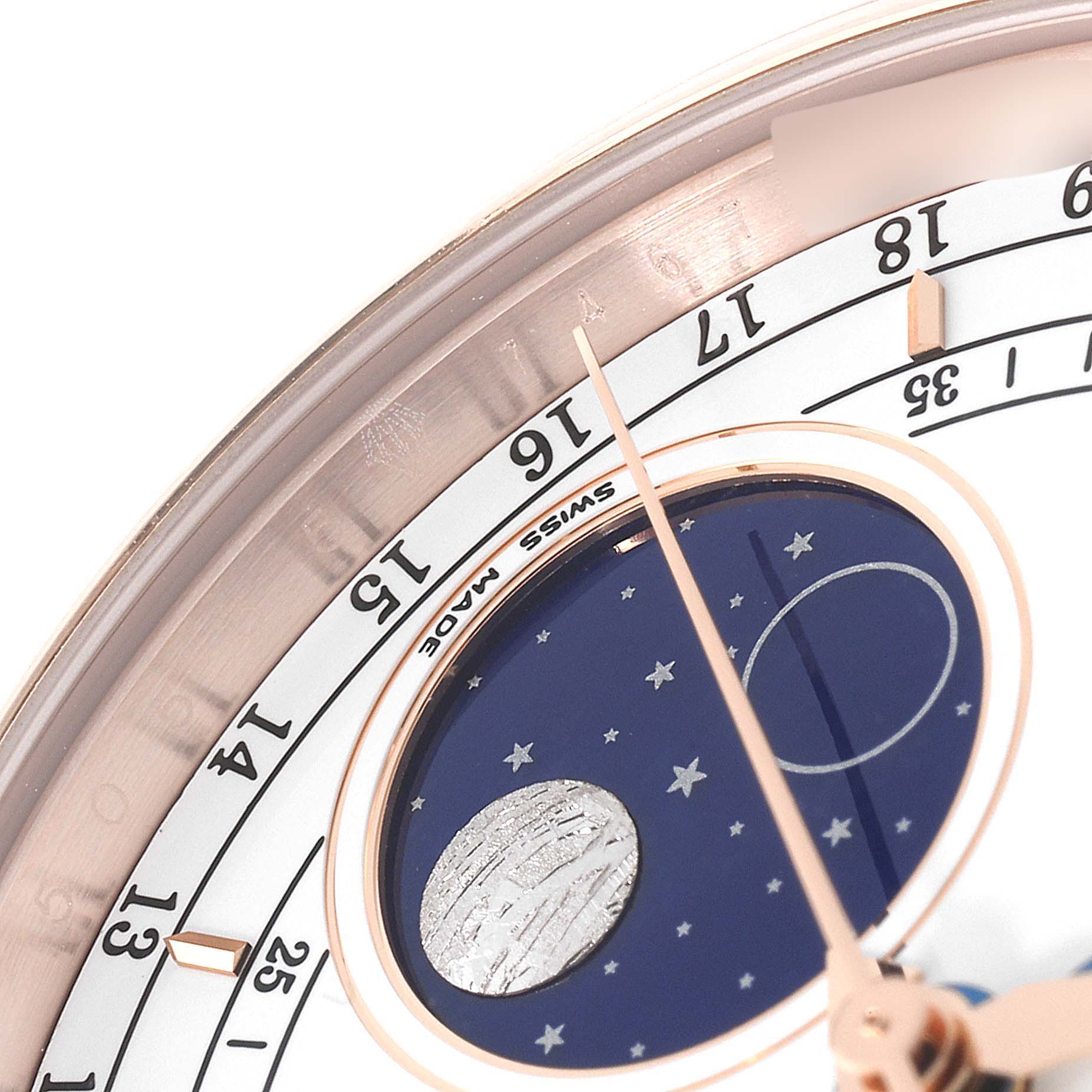 Close-up of the Rolex Cellini 50535 Men's Rose Gold White Dial 50535 Men's Rose Gold White Dial watch face, showing the moon phase dial and partial hour indicators.