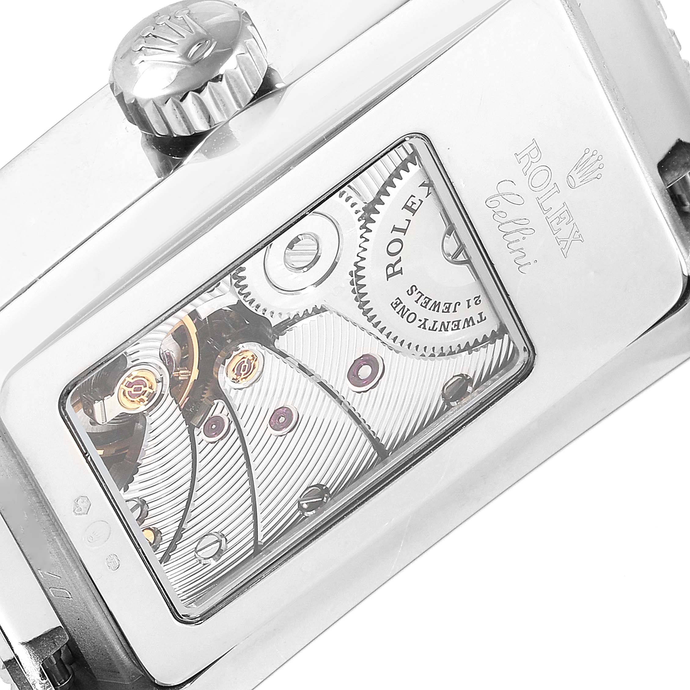 The image shows the back of a Rolex Cellini 5441/9 Men
s White Gold Silver Dial 5441/9 Men
s White Gold Silver Dial watch, highlighting the intricate mechanical movement and crown.