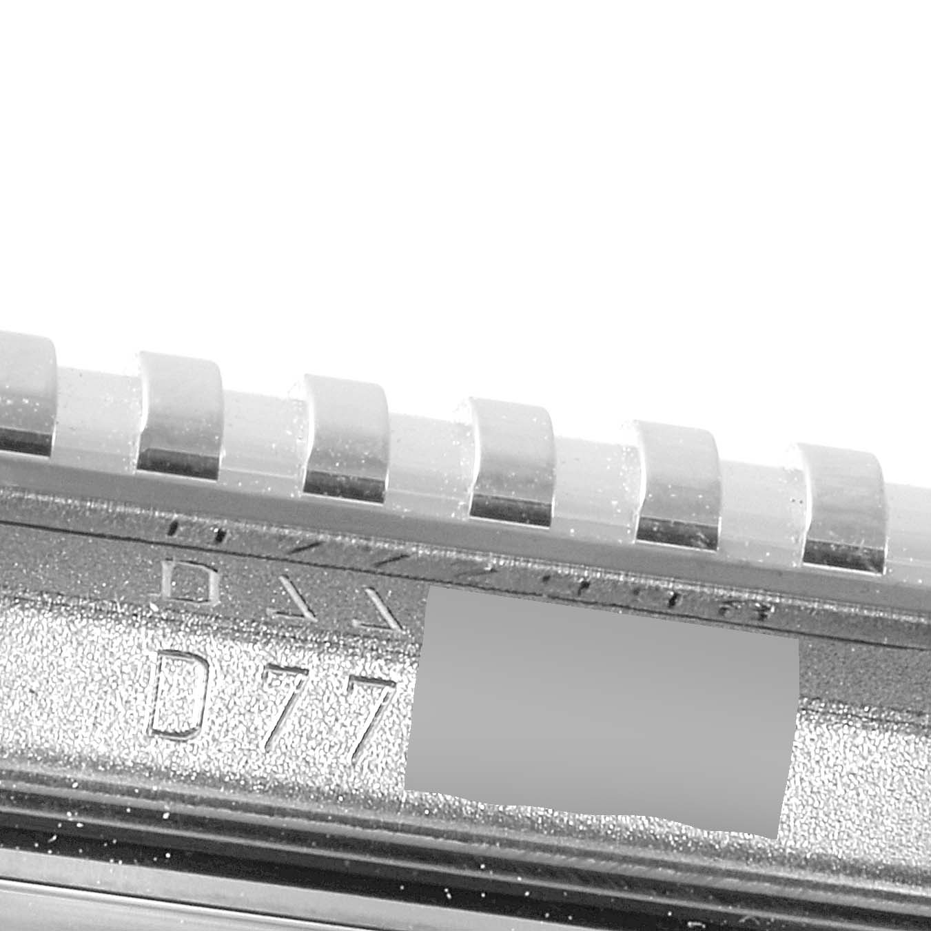 This image shows a close-up of the serial number engraved on the side of a Rolex Cellini 5441/9 Men
s White Gold Silver Dial 5441/9 Men
s White Gold Silver Dial watch case.