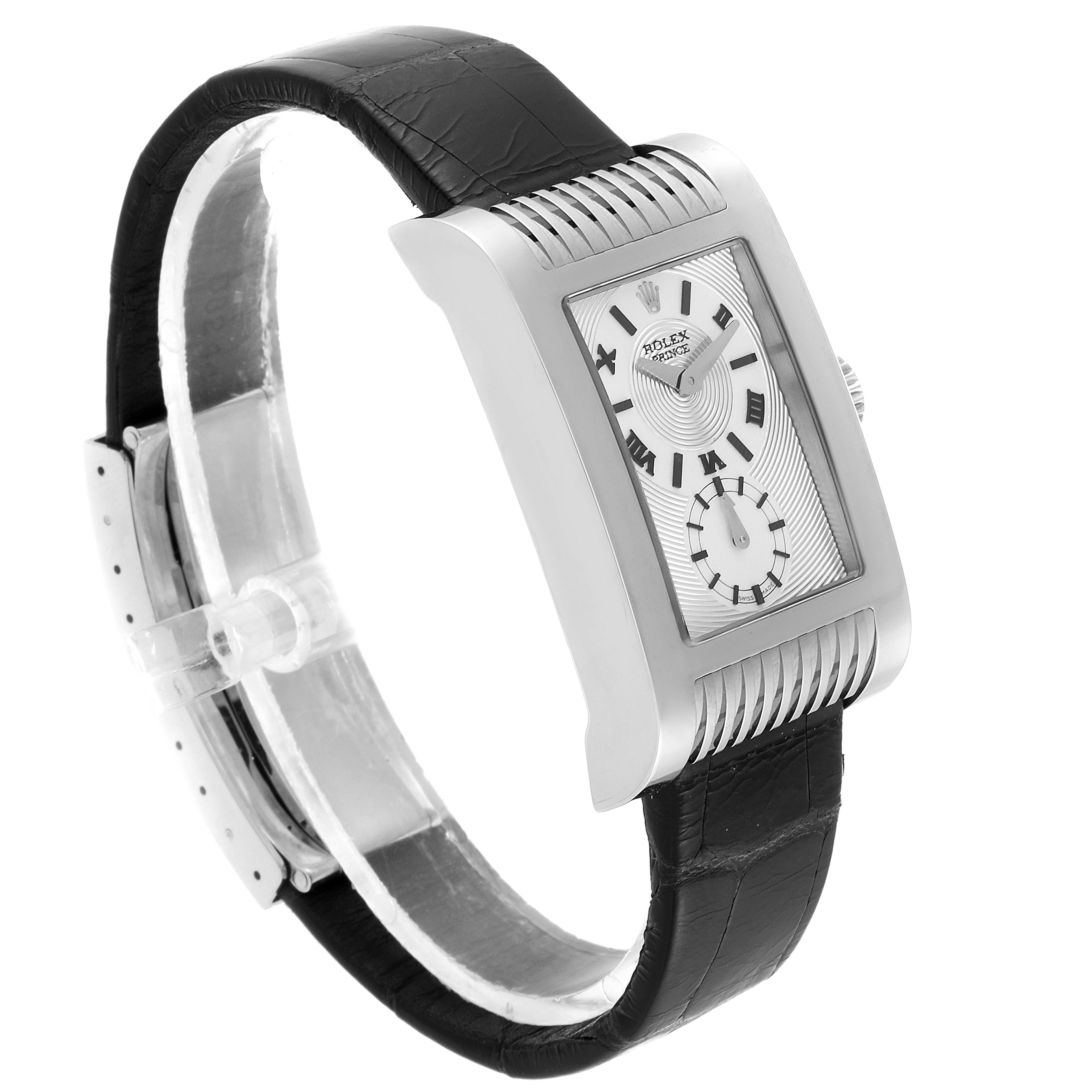 The image shows a side-angle view of a Rolex Cellini 5441/9 Men
s White Gold Silver Dial 5441/9 Men
s White Gold Silver Dial watch, highlighting its silver case, black leather strap, and dual subdials.