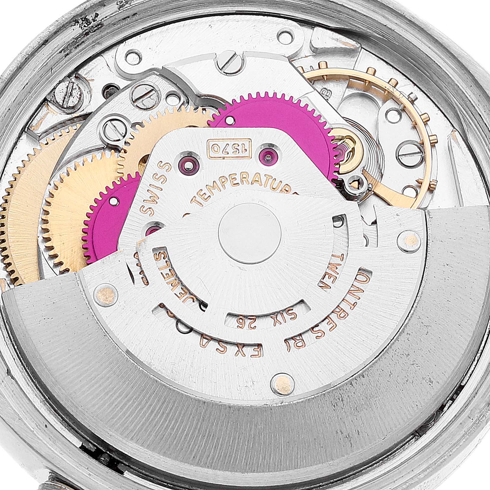 This image shows a close-up of the inner mechanical movement of a Rolex Vintage Collection 1500 Men
s Stainless Steel Black Dial 1500 Men
s Stainless Steel Black Dial model watch.