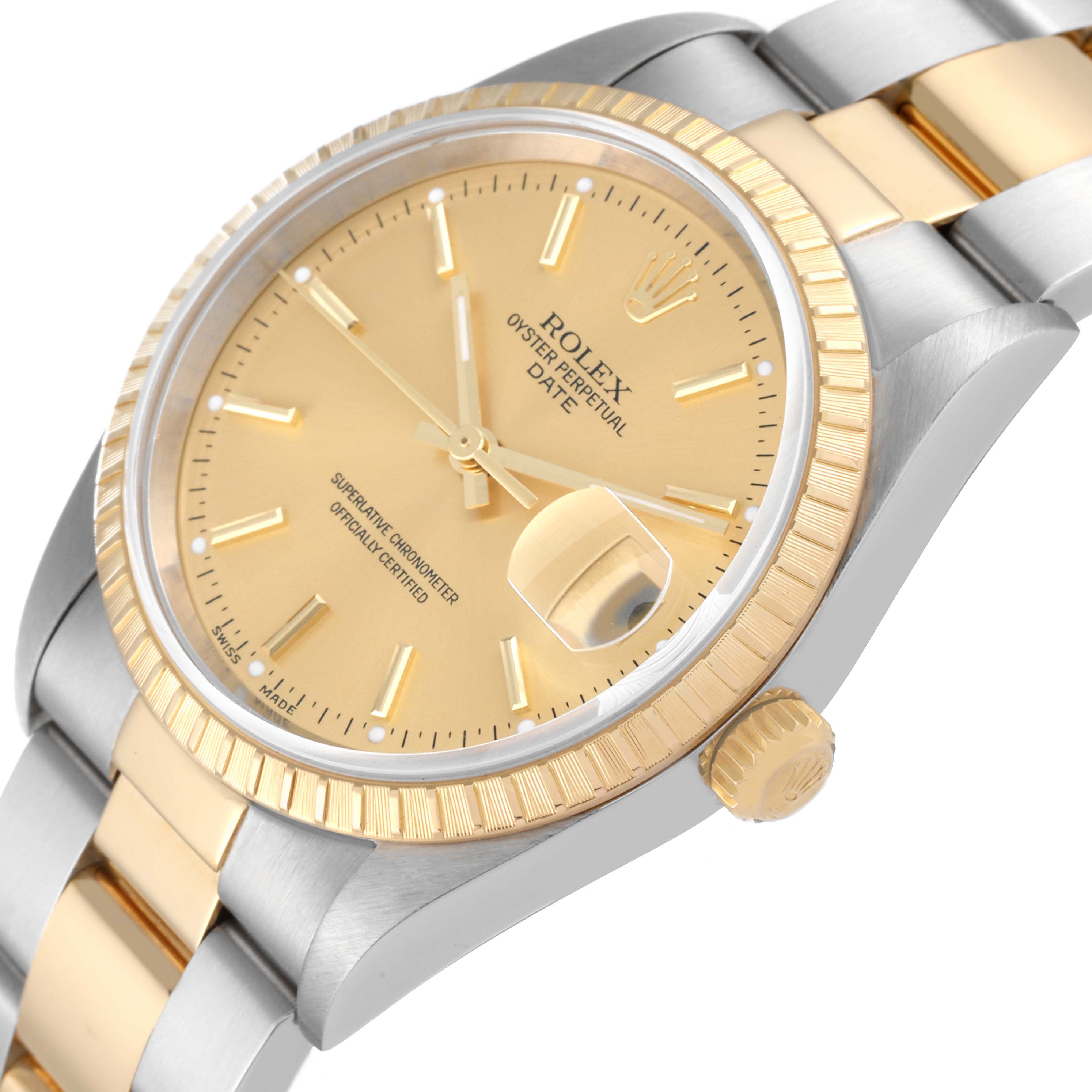 The Rolex Date 15223 Men's Steel and Gold (two tone) Champagne Dial 15223 Men's Steel and Gold (two tone) Champagne Dial model watch is shown at an angled side view, highlighting its dial, bezel, crown, and part of the bracelet.