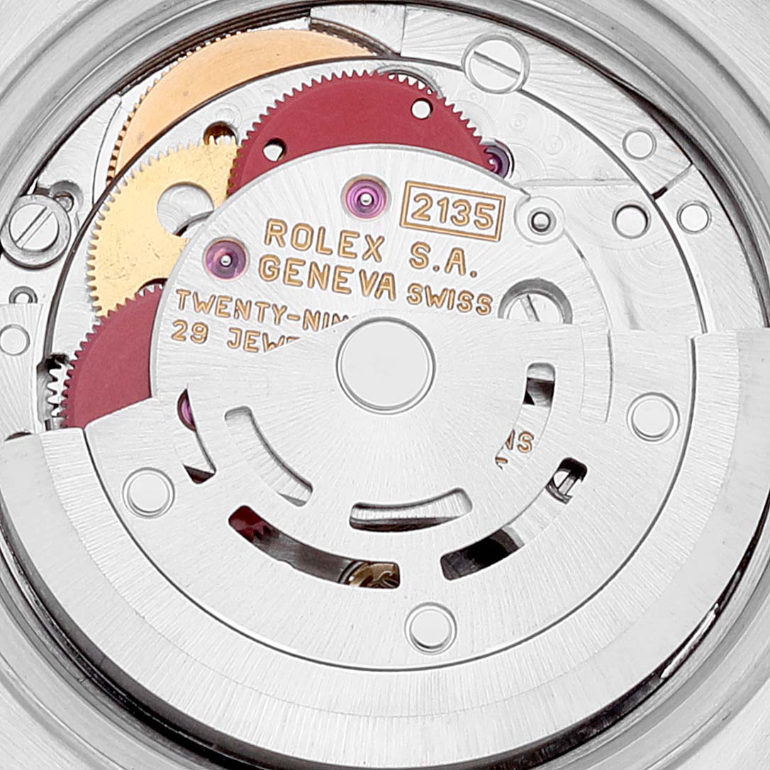 This image shows a close-up view of the movement mechanism of a Rolex Date 69173 Women's Steel and Gold (two tone) Silver Dial 69173 Women's Steel and Gold (two tone) Silver Dial model watch.