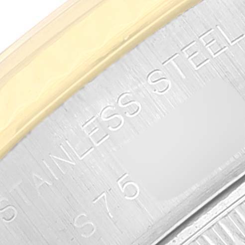 The image shows a close-up of the outer edge of a Rolex Date 69173 Women's Steel and Gold (two tone) Silver Dial 69173 Women's Steel and Gold (two tone) Silver Dial model watch, highlighting the "STAINLESS STEEL" engraving.