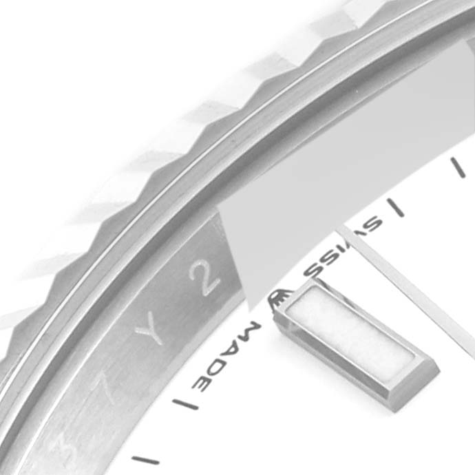 The image shows a close-up of the bezel, the edge of the dial, and part of the hour markers of the Rolex Datejust 41 126334 Men's Stainless Steel White Dial 126334 Men's Stainless Steel White Dial watch.