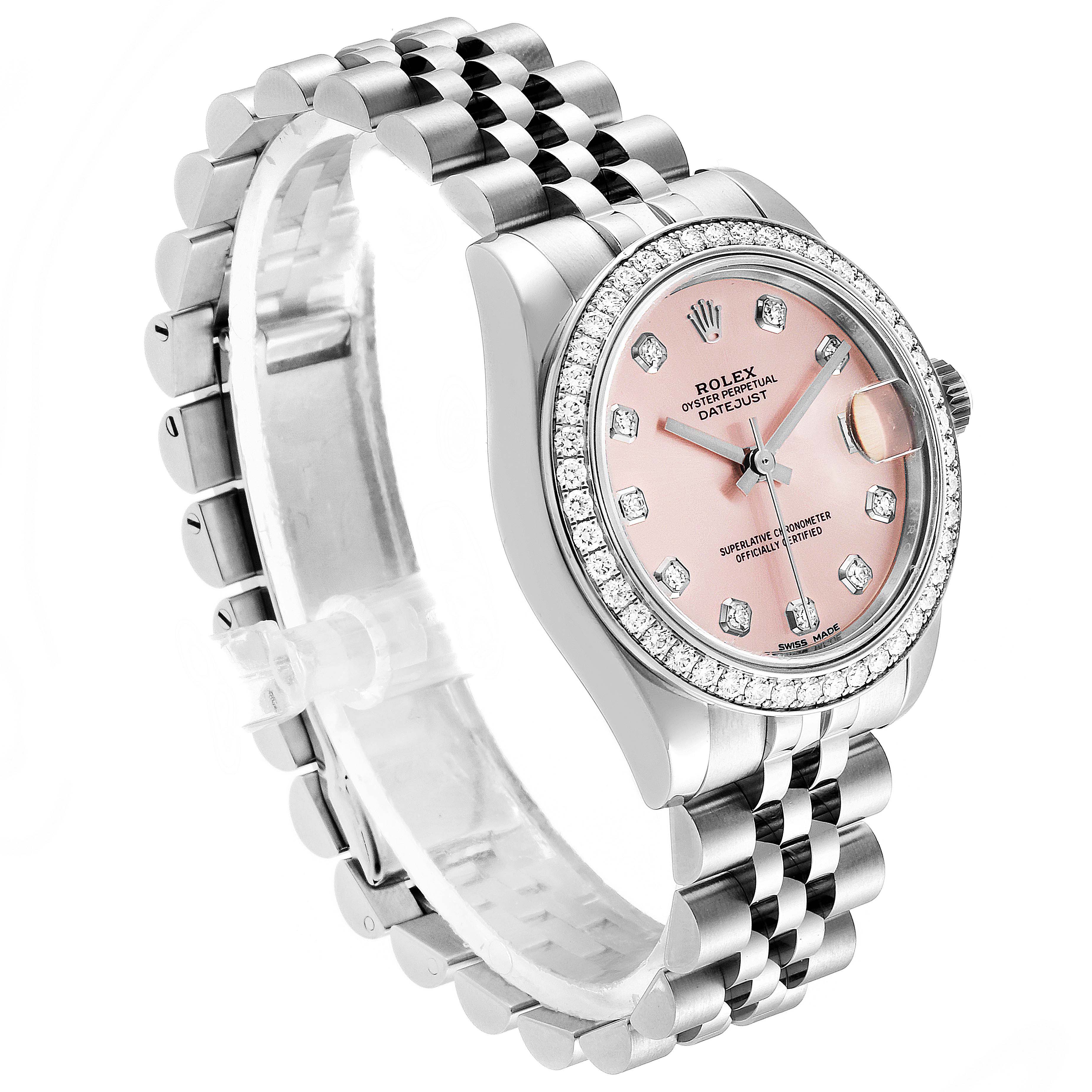 The image shows a mid-side model Rolex Datejust watch at a three-quarter angle, highlighting its face, bezel, crown, and bracelet.