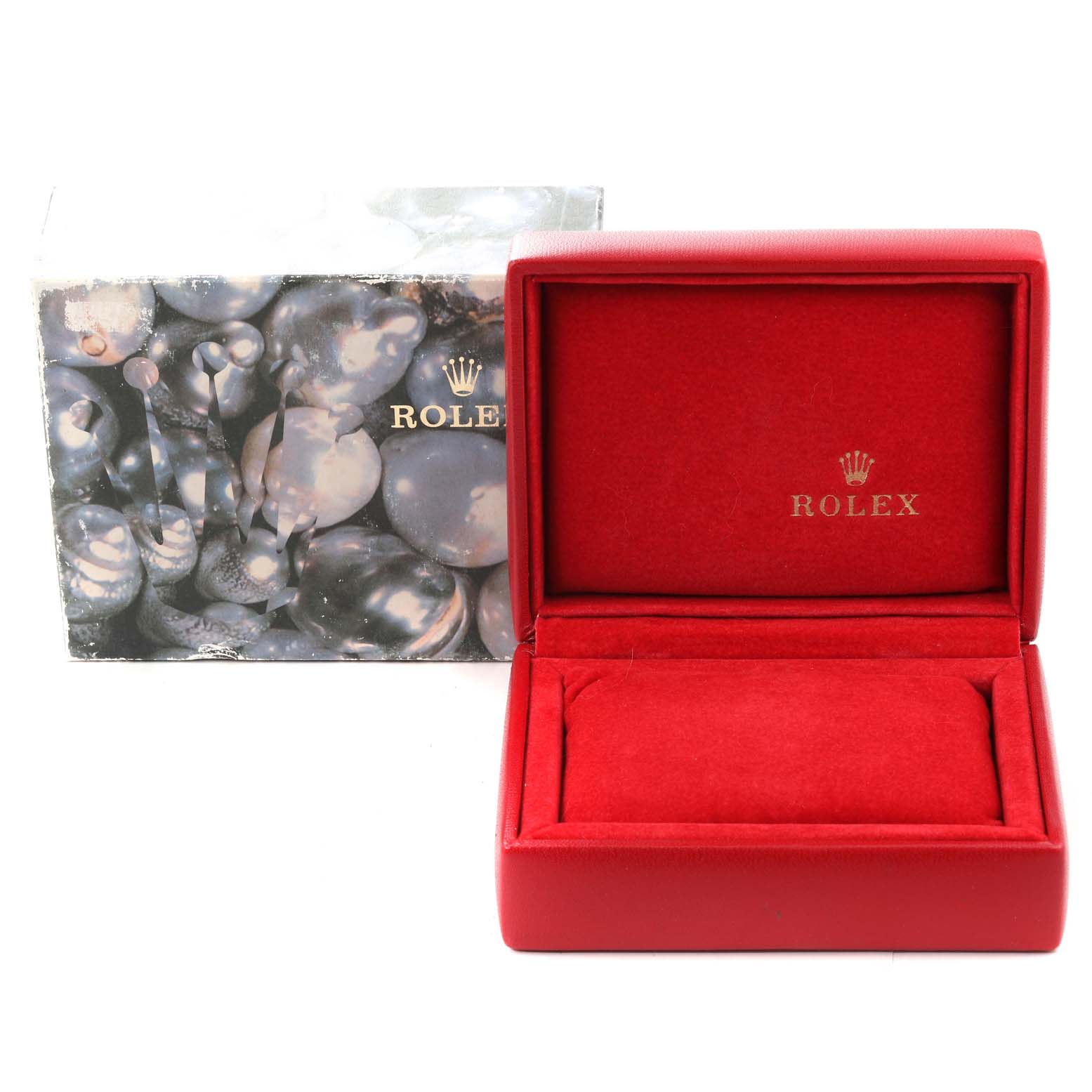 The image shows a red Rolex watch box and packaging for the President model, with the box open and the logo visible.