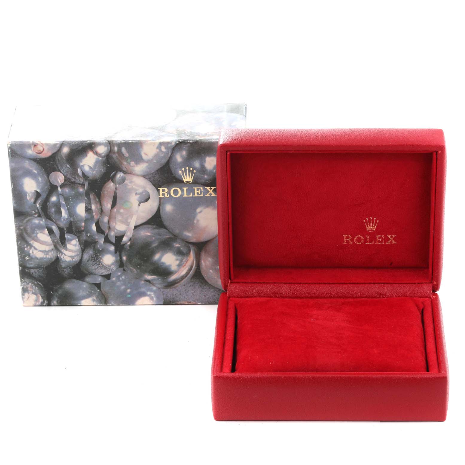 The image shows a red Rolex watch box for the President model, with the box open displaying its interior.