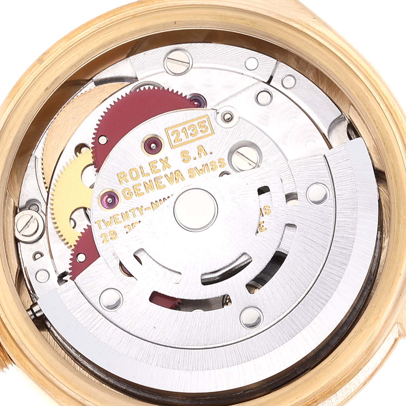 The image shows the inner mechanical parts and movement of a Rolex President 69178 Women
s Yellow Gold Champagne Dial 69178 Women
s Yellow Gold Champagne Dial model watch from a top-down angle.