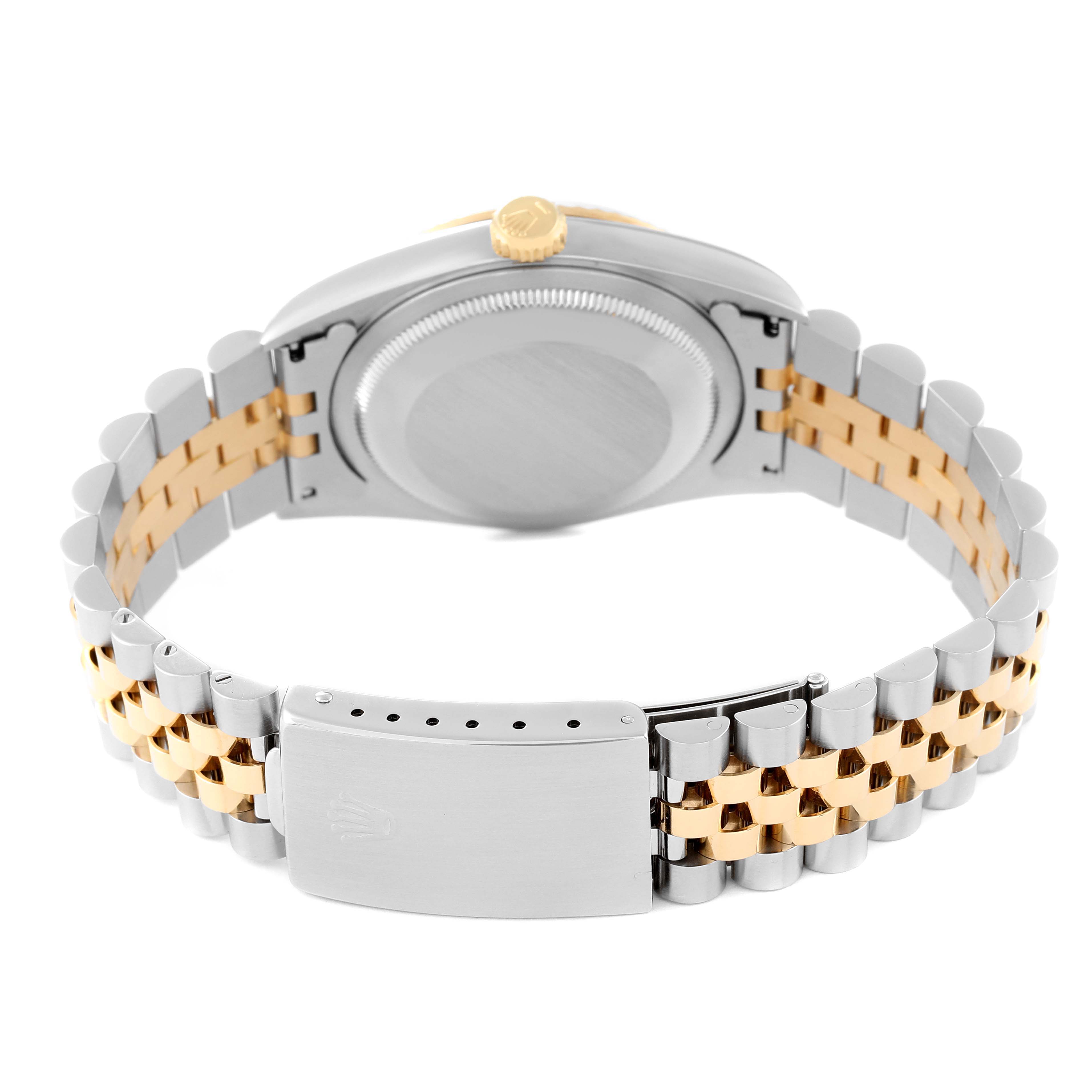 This image of the Rolex Datejust 16233 Men's Steel and Gold (two tone) Champagne Dial 16233 Men's Steel and Gold (two tone) Champagne Dial watch is taken from the case back, showcasing the two-tone bracelet and clasp.