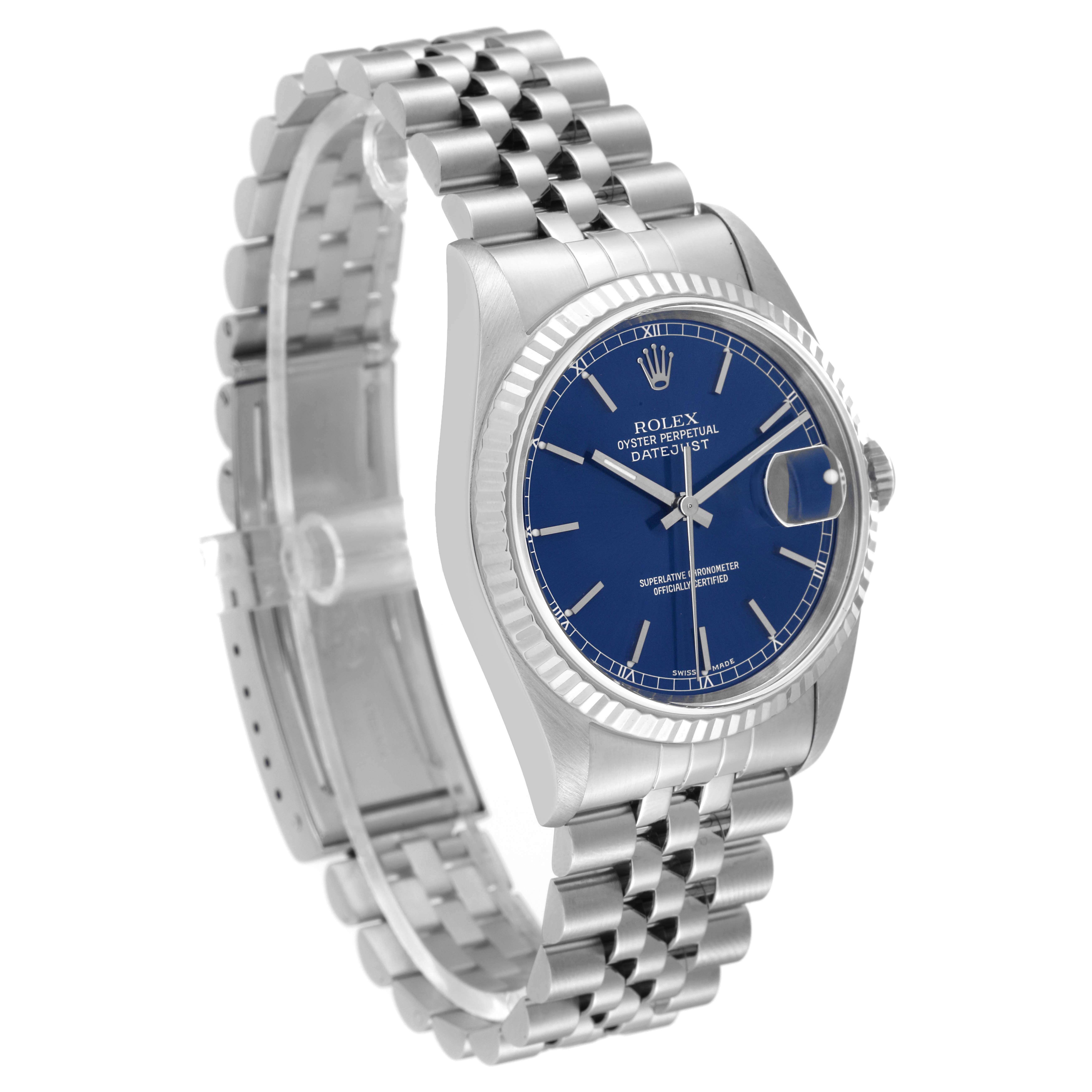The image shows a Rolex Datejust 16234 Men's Stainless Steel Blue Dial 16234 Men's Stainless Steel Blue Dial watch at a 3/4 angle, highlighting its blue dial, fluted bezel, and jubilee bracelet.