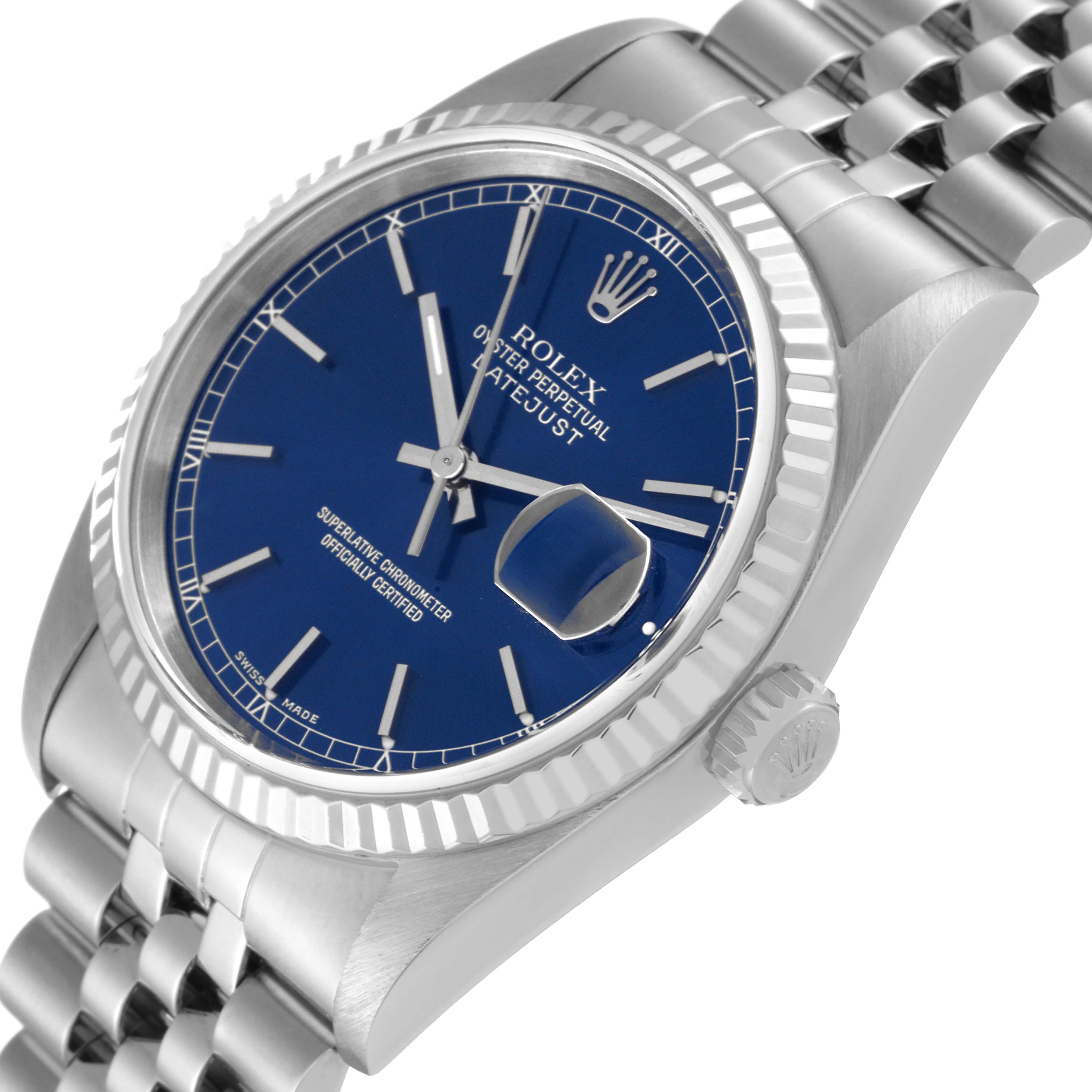 The image shows a close-up angled view of a Rolex Datejust 16234 Men's Stainless Steel Blue Dial 16234 Men's Stainless Steel Blue Dial with a blue dial, jubilee bracelet, and fluted bezel.