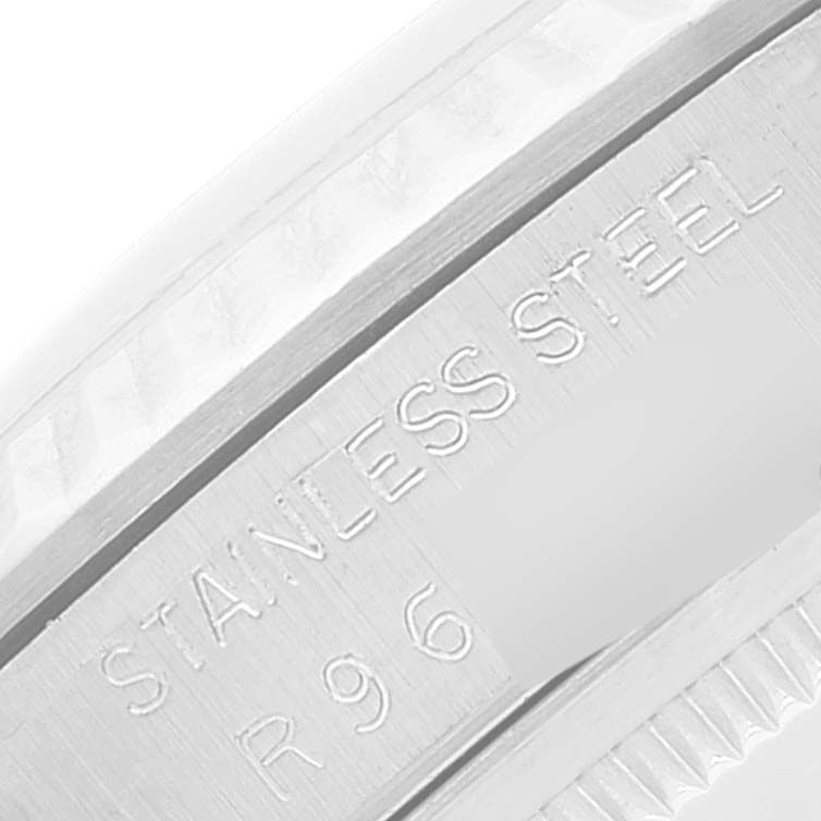 This is a close-up image of the side bezel and inner rim of a stainless steel Rolex Datejust 16234 Men's Stainless Steel Silver Dial 16234 Men's Stainless Steel Silver Dial watch.
