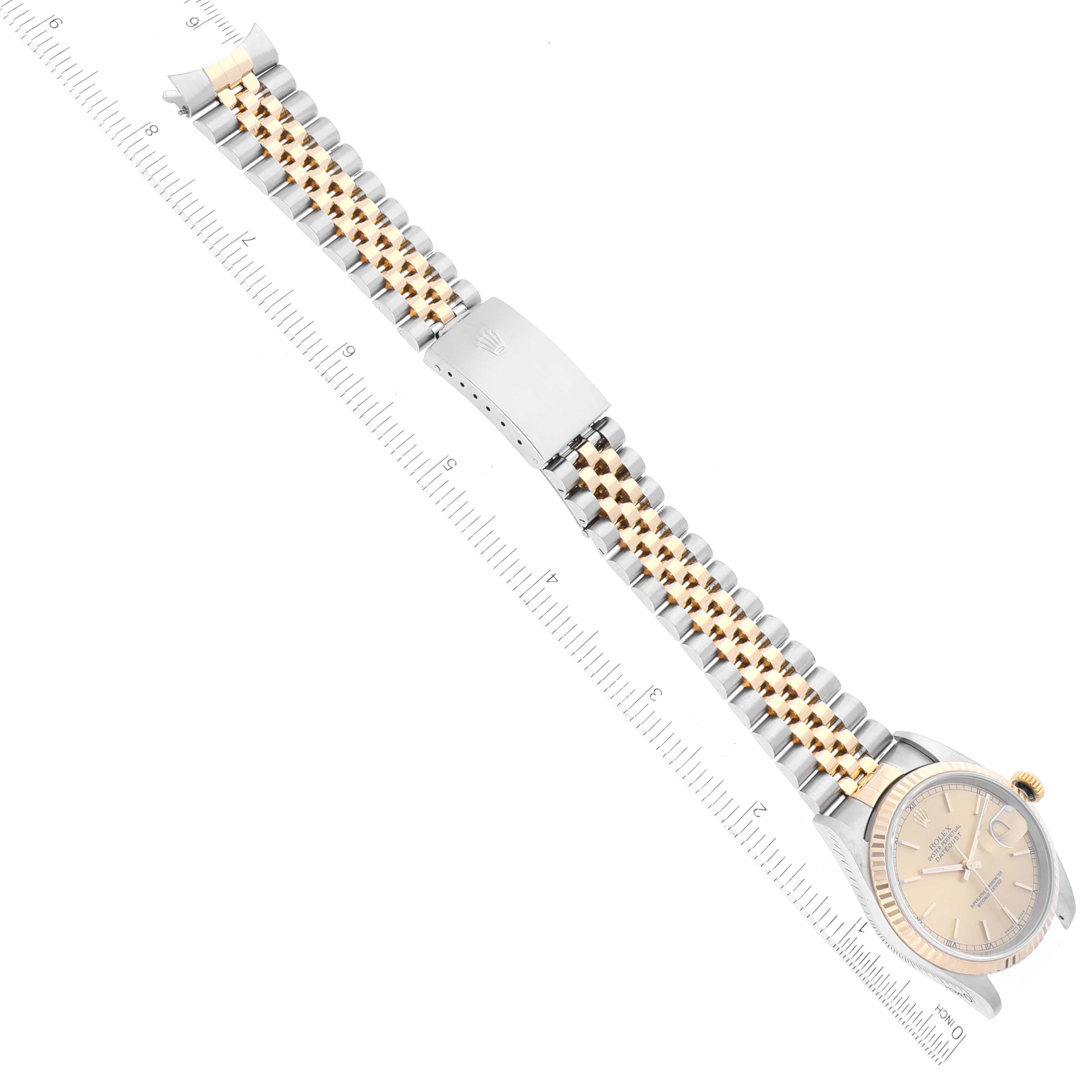 The image shows a Rolex Datejust 16233 Men's Steel and Gold (two tone) Champagne Dial 16233 Men's Steel and Gold (two tone) Champagne Dial watch lying flat, displaying its dial, two-tone bracelet, and clasp.