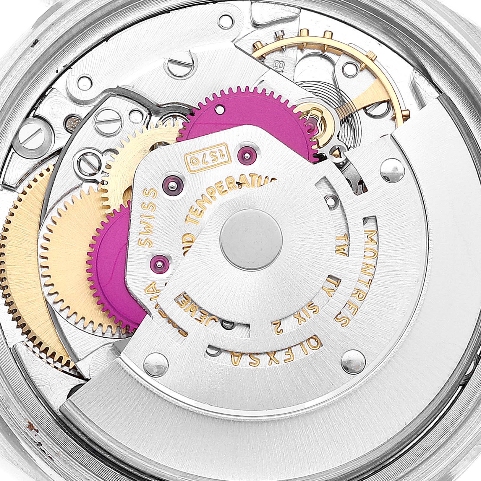 This image shows a close-up view of the movement mechanism of a Rolex Vintage Collection 1601 Men
s Steel and Gold (two tone) Champagne Dial 1601 Men
s Steel and Gold (two tone) Champagne Dial watch.