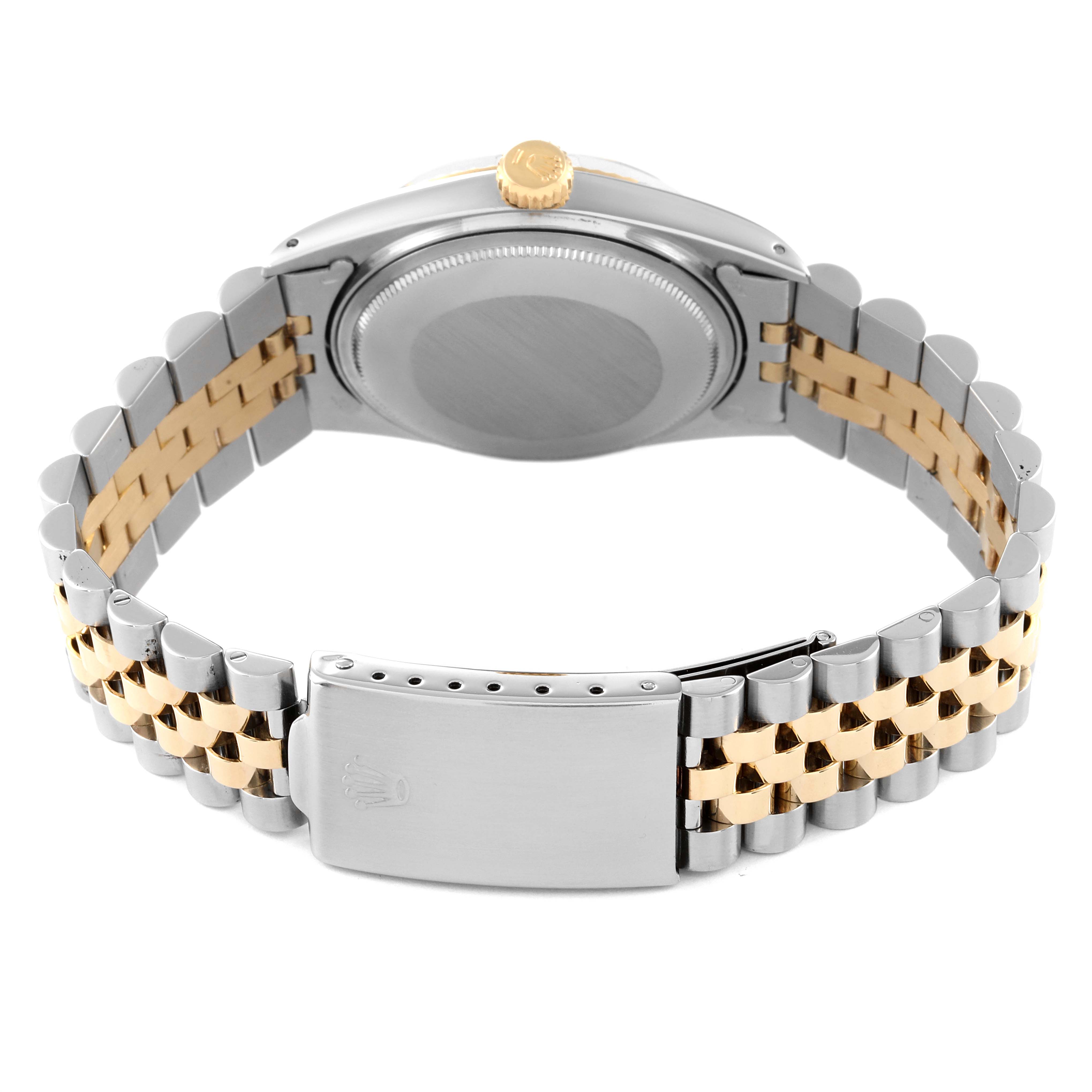 The image shows the back view of a Rolex Vintage Collection 1601 Men
s Steel and Gold (two tone) Champagne Dial 1601 Men
s Steel and Gold (two tone) Champagne Dial watch, highlighting the case back, crown, and metal bracelet.