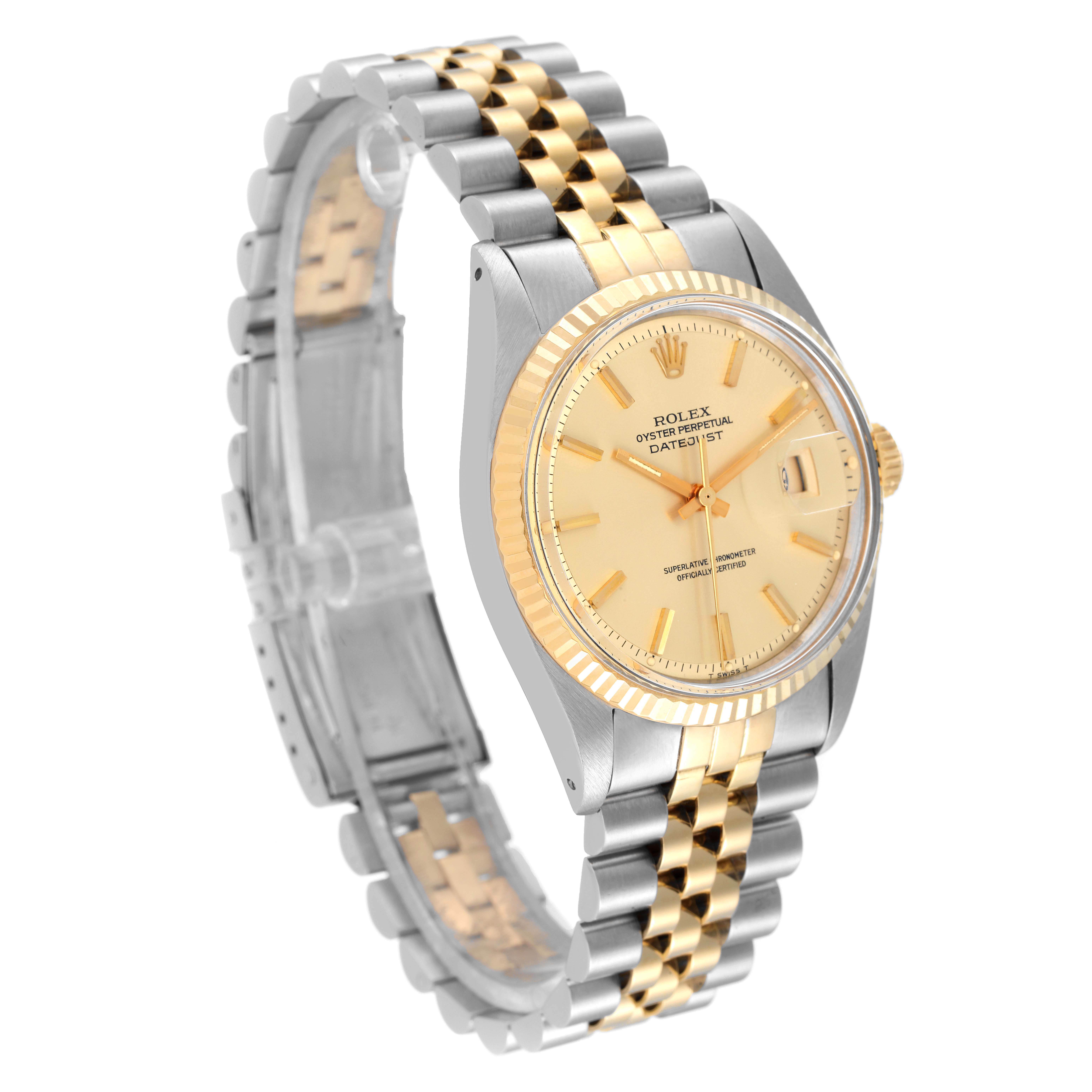 The image shows a close-up, angled view of a Rolex Vintage Collection 1601 Men
s Steel and Gold (two tone) Champagne Dial 1601 Men
s Steel and Gold (two tone) Champagne Dial watch, displaying its gold and silver bracelet and dial.