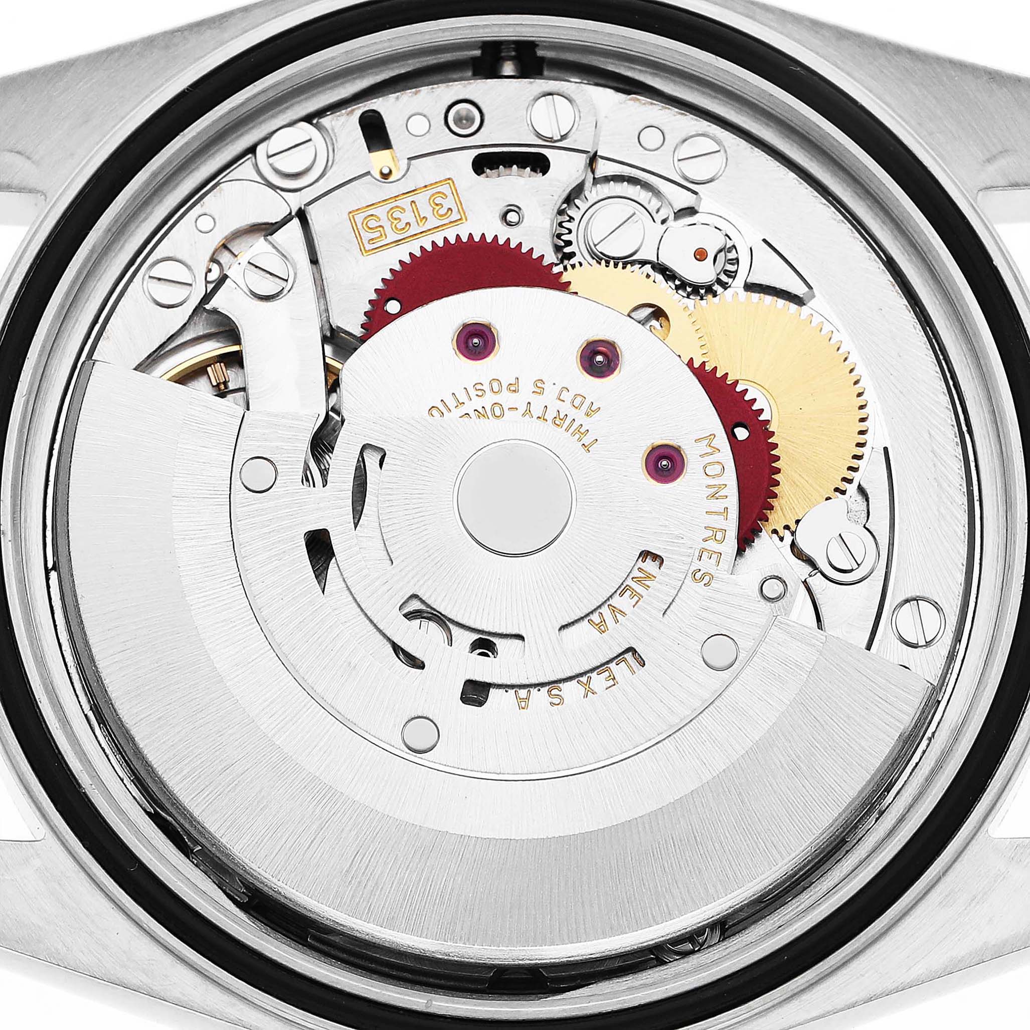 The image shows the movement of a Rolex Datejust 16233 Men's Stainless Steel Black Dial watch viewed from the back, highlighting gears and inscriptions.