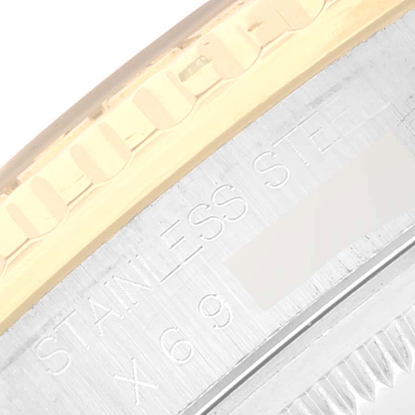 The image shows a close-up of the case side and bezel of a Rolex Turn-o-Graph 16263 Men
s Steel and Gold (two tone) Black Dial 16263 Men
s Steel and Gold (two tone) Black Dial model watch, highlighting the engraving.