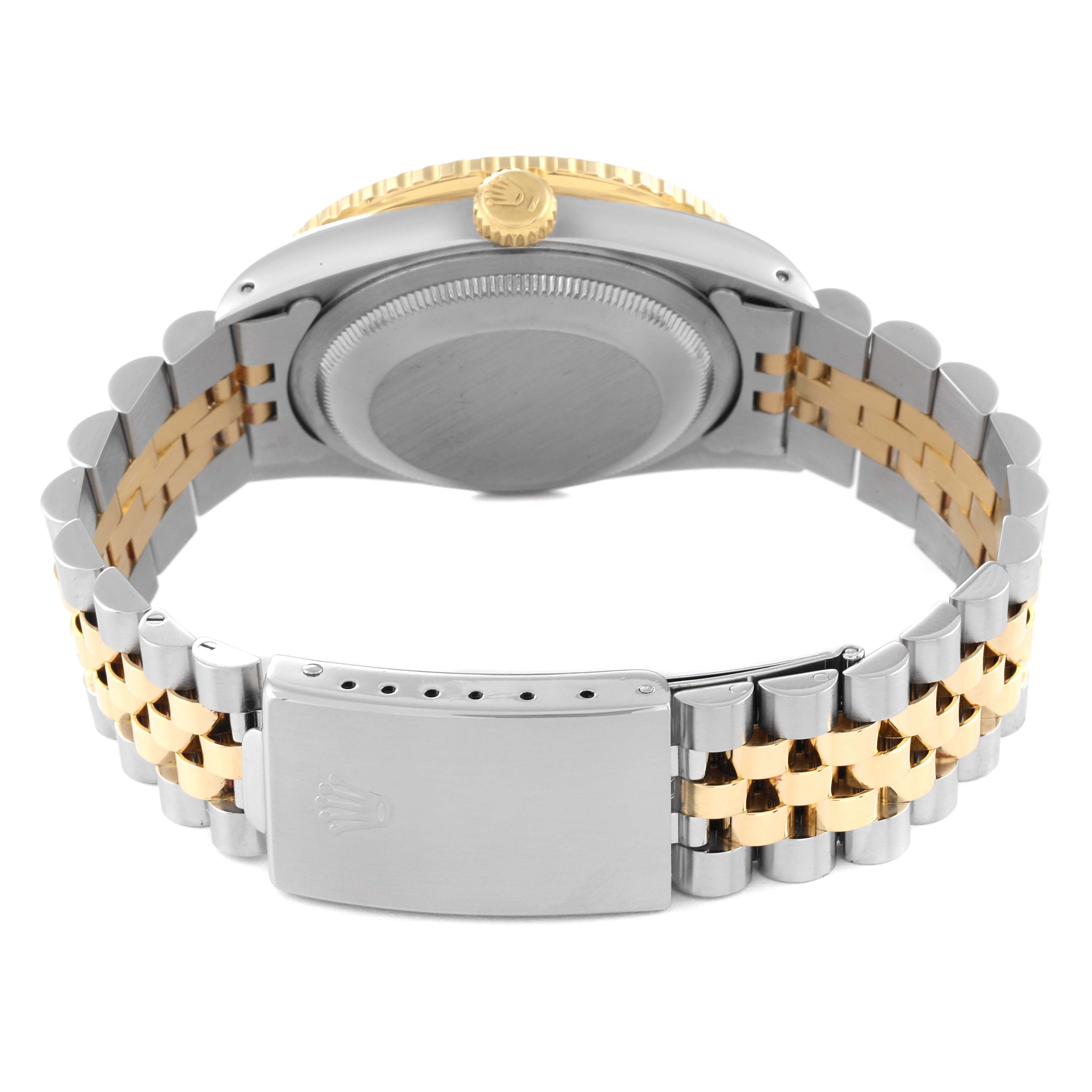 The image shows the back and side view of a Rolex Turn-o-Graph 16263 Men
s Steel and Gold (two tone) Black Dial 16263 Men
s Steel and Gold (two tone) Black Dial watch, highlighting its clasp, case back, and two-tone bracelet.