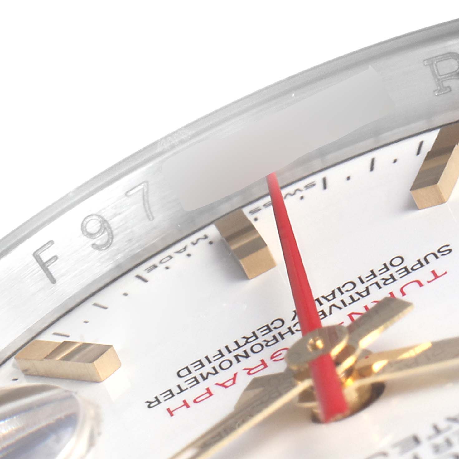 The image shows a close-up of the Rolex Turn-o-Graph 116263 Men's Steel and Gold (two tone) White Dial 116263 Men's Steel and Gold (two tone) White Dial model, highlighting the bezel, dial, hands, and part of the written text.