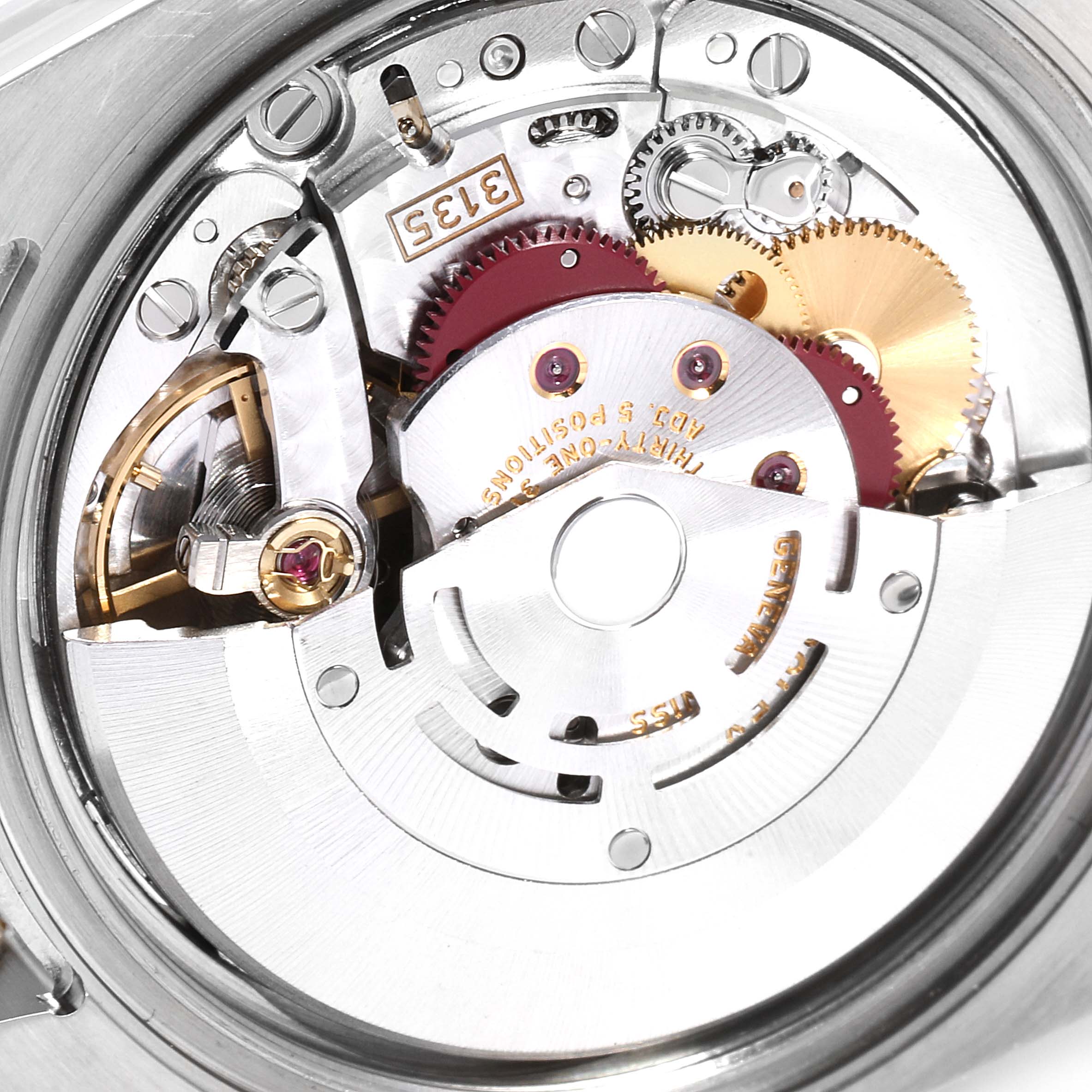 The image shows the intricate internal movement mechanism of a Rolex Turn-o-Graph 116263 Men's Steel and Gold (two tone) White Dial 116263 Men's Steel and Gold (two tone) White Dial watch from a close-up angle.