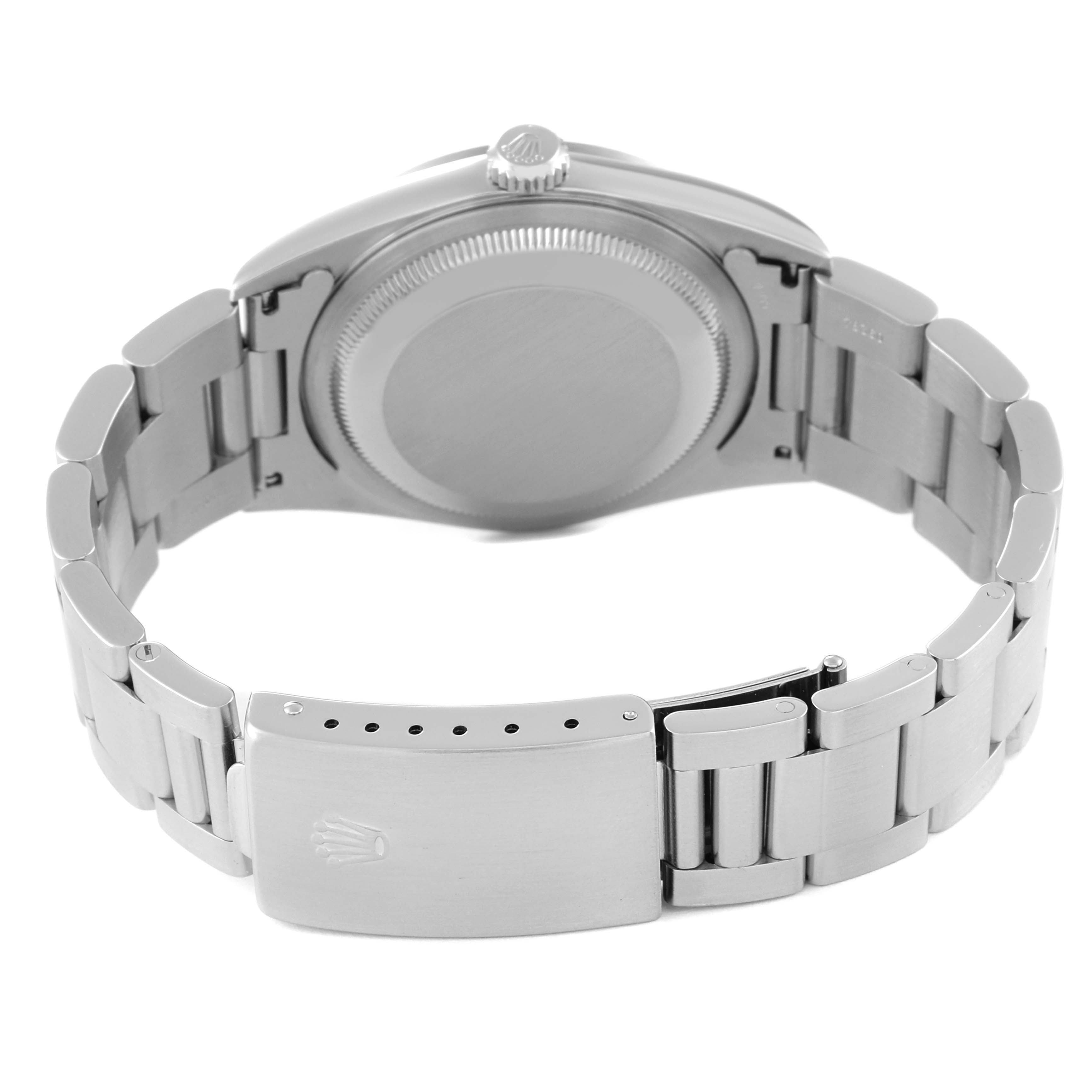 The image shows the backside and bracelet of a Rolex Datejust 16200 Men's Stainless Steel White Dial 16200 Men's Stainless Steel White Dial watch, highlighting the clasp and case.