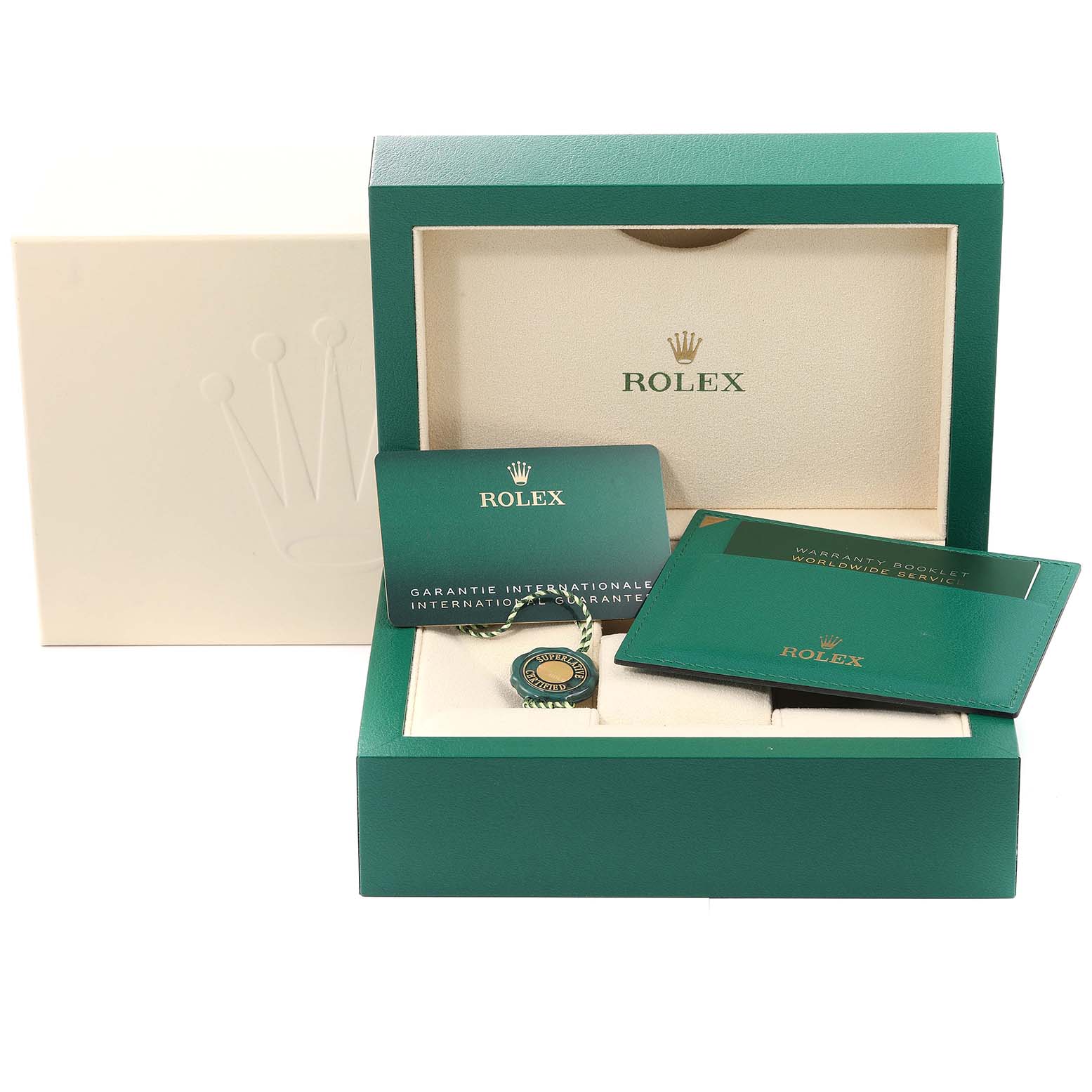 The image shows a Rolex Explorer 226570 Men
s Stainless Steel White Dial 226570 Men
s Stainless Steel White Dial watch box and accessories, including manuals, warranty card, and hang tag, viewed from the front.